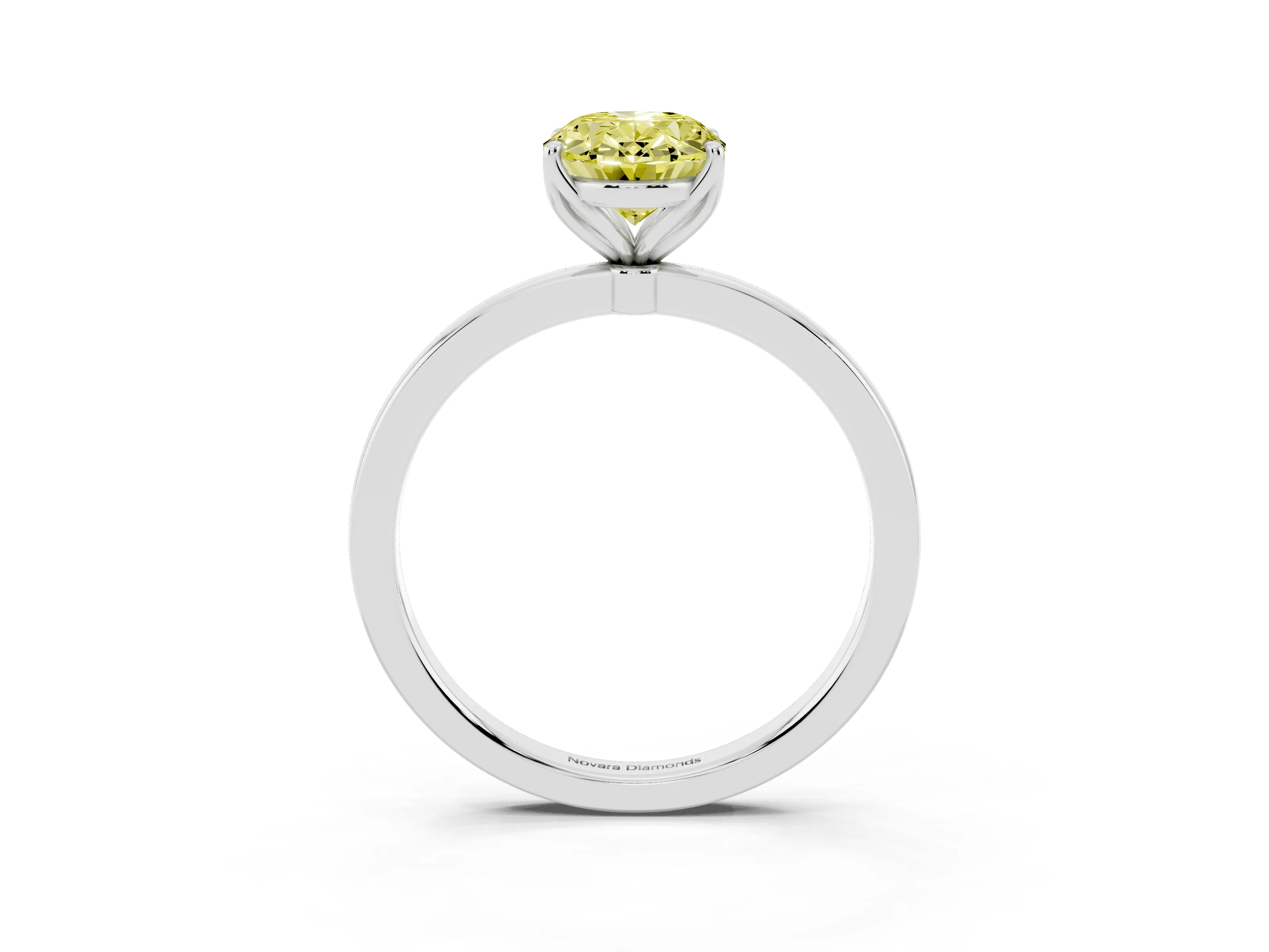 Fancy Yellow Oval Cut Diamond Solitaire Ring Set in White gold with Prong Setting and Thin Polished Band