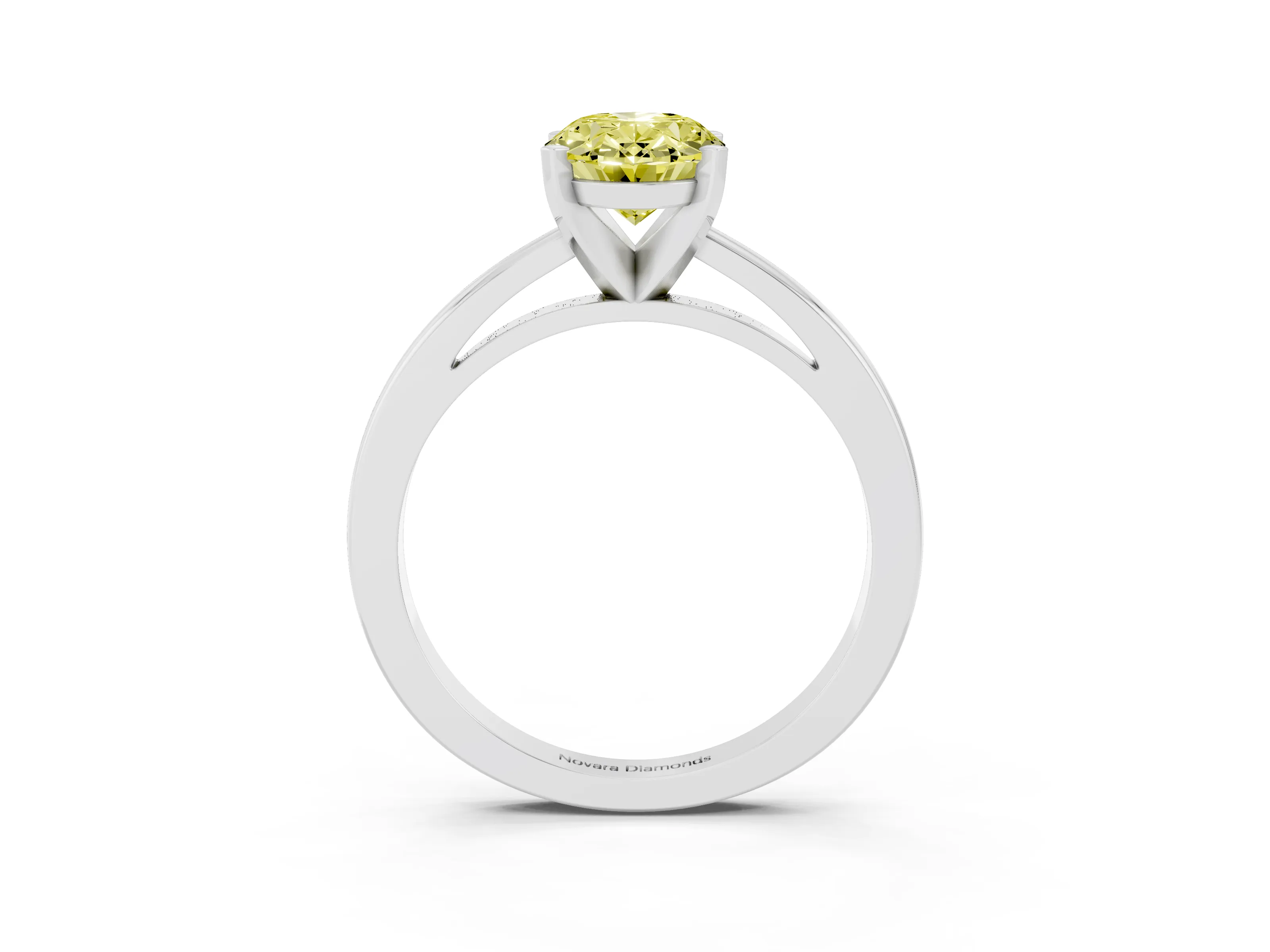 Fancy Yellow Oval Cut Diamond Solitaire Engagement Ring Set in Silver with Prong Setting on a Classic Band