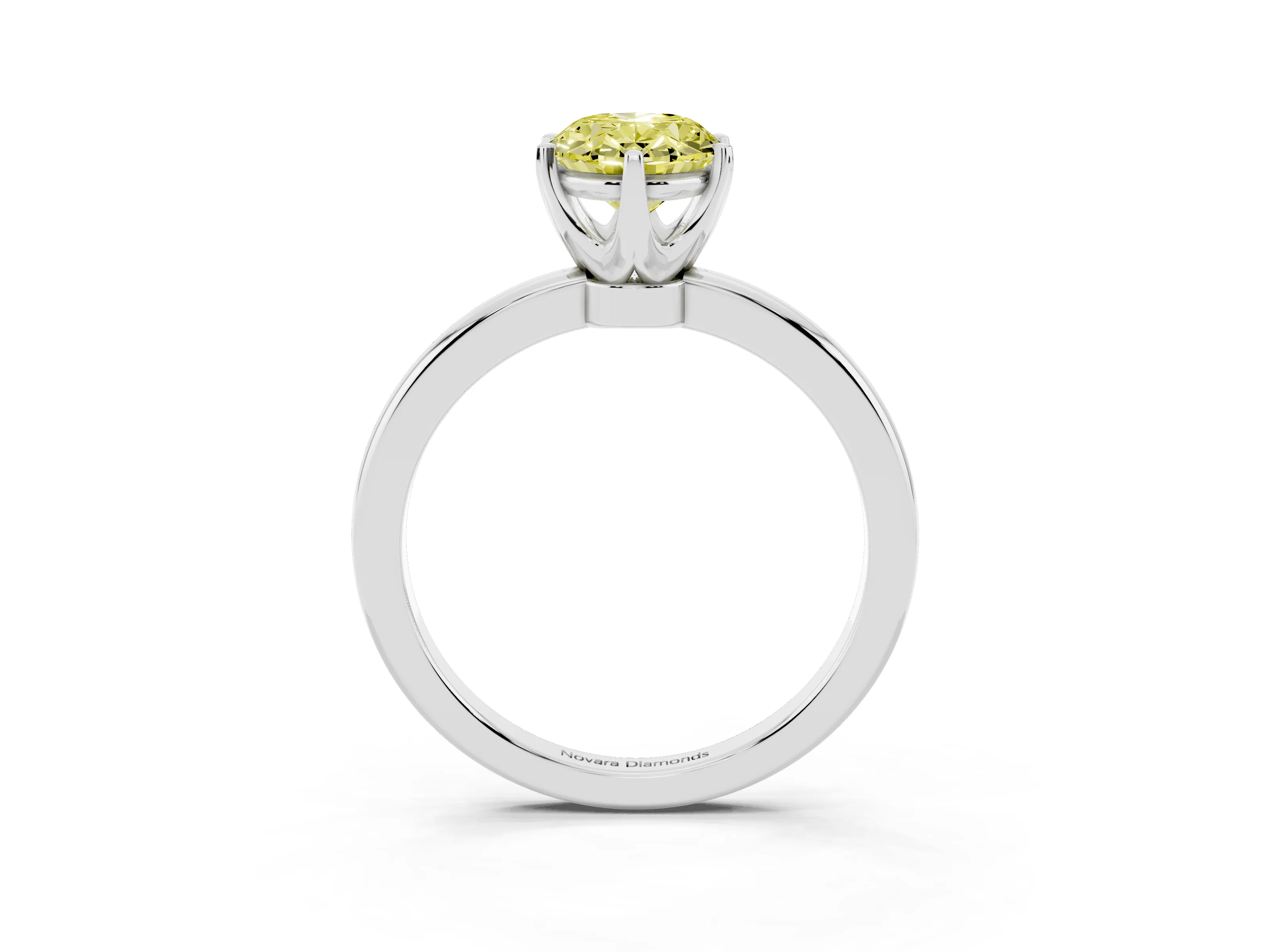Fancy Yellow Oval Cut Diamond Solitaire Ring Set in White gold with Raised Prong Setting on a Classic Band