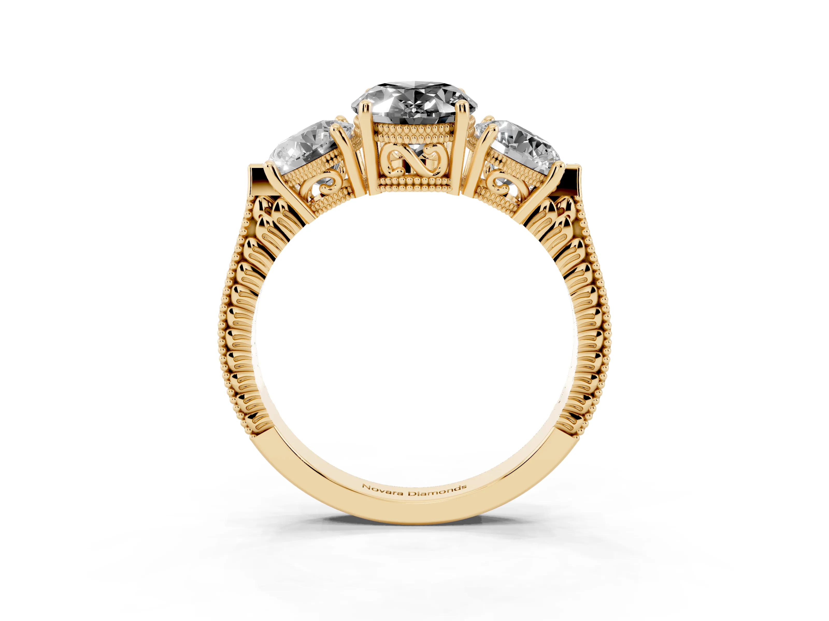 Fancy Black Oval Cut Diamond Three-Stone Ring Set in Yellow gold with Milgrain Band