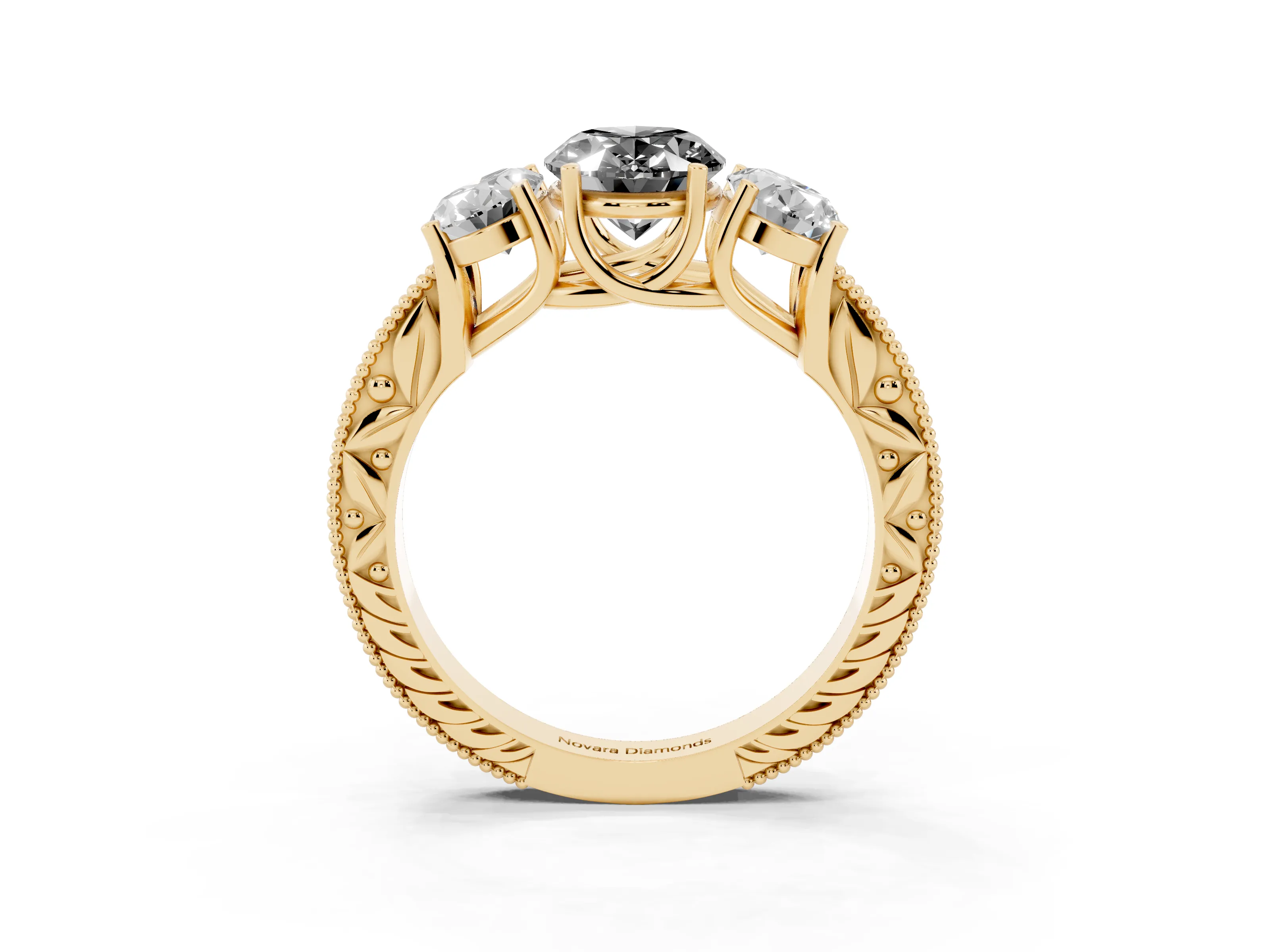 Fancy Black Oval Cut Diamond Three-Stone Engagement Ring Set in Yellow gold with Milgrain Pavé Band
