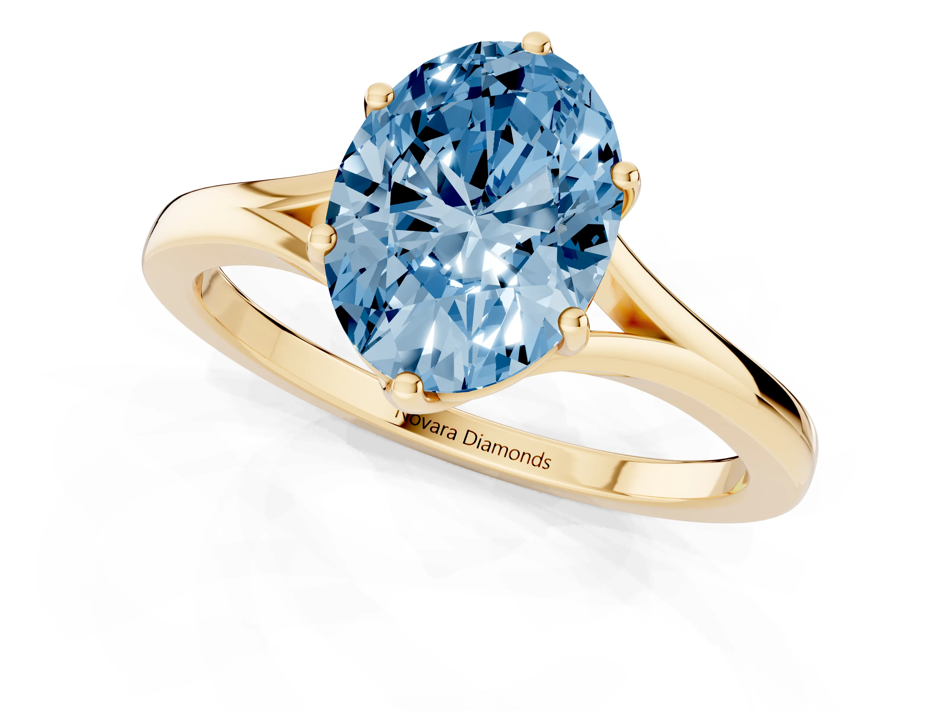Fancy Blue Oval Cut Diamond Solitaire Ring Set in Yellow gold with Polished Tapered Band and Prong Setting