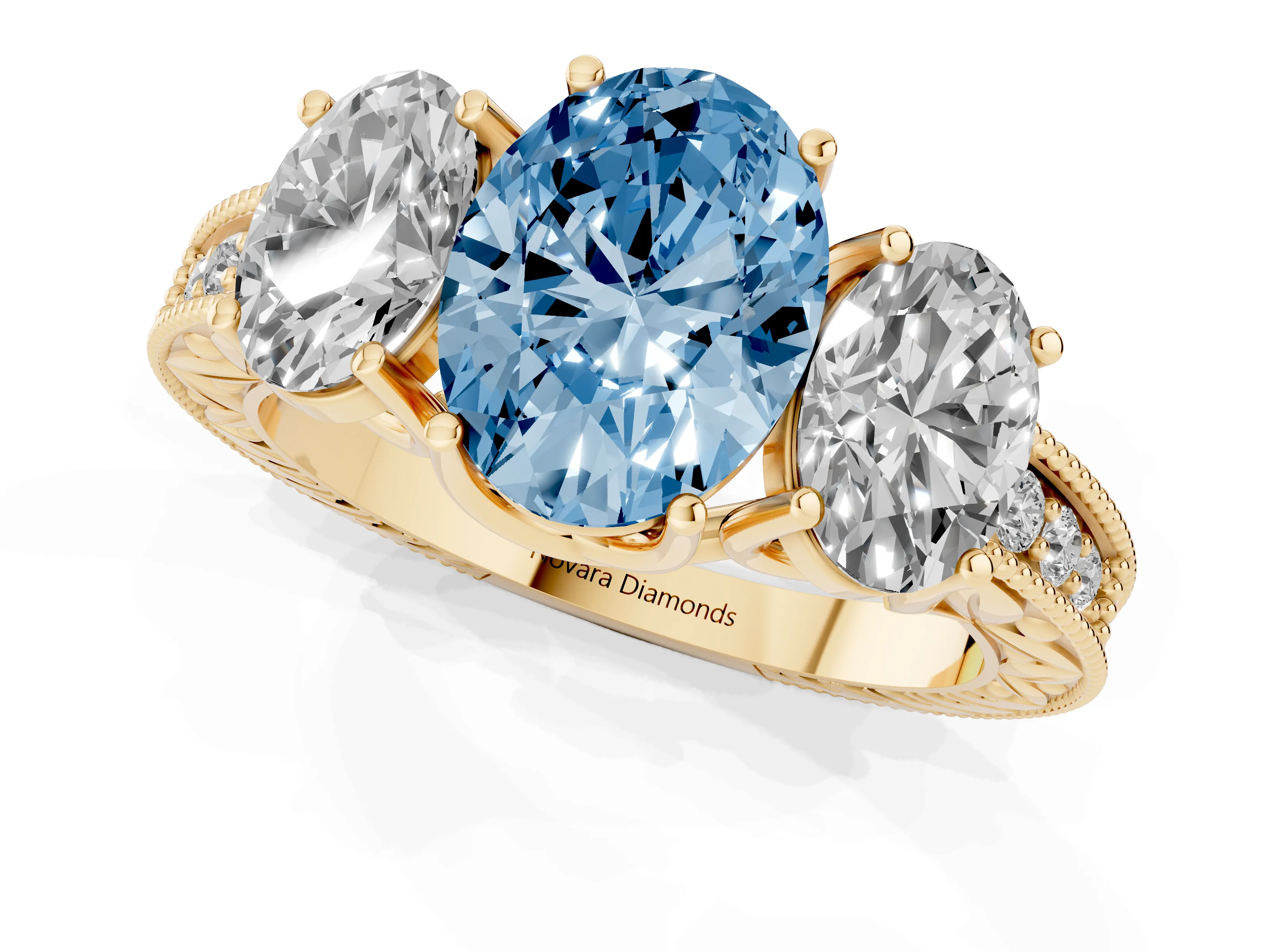 Fancy Blue Oval Cut Diamond Three-Stone Engagement Ring Set in Yellow gold with Milgrain Pavé Band