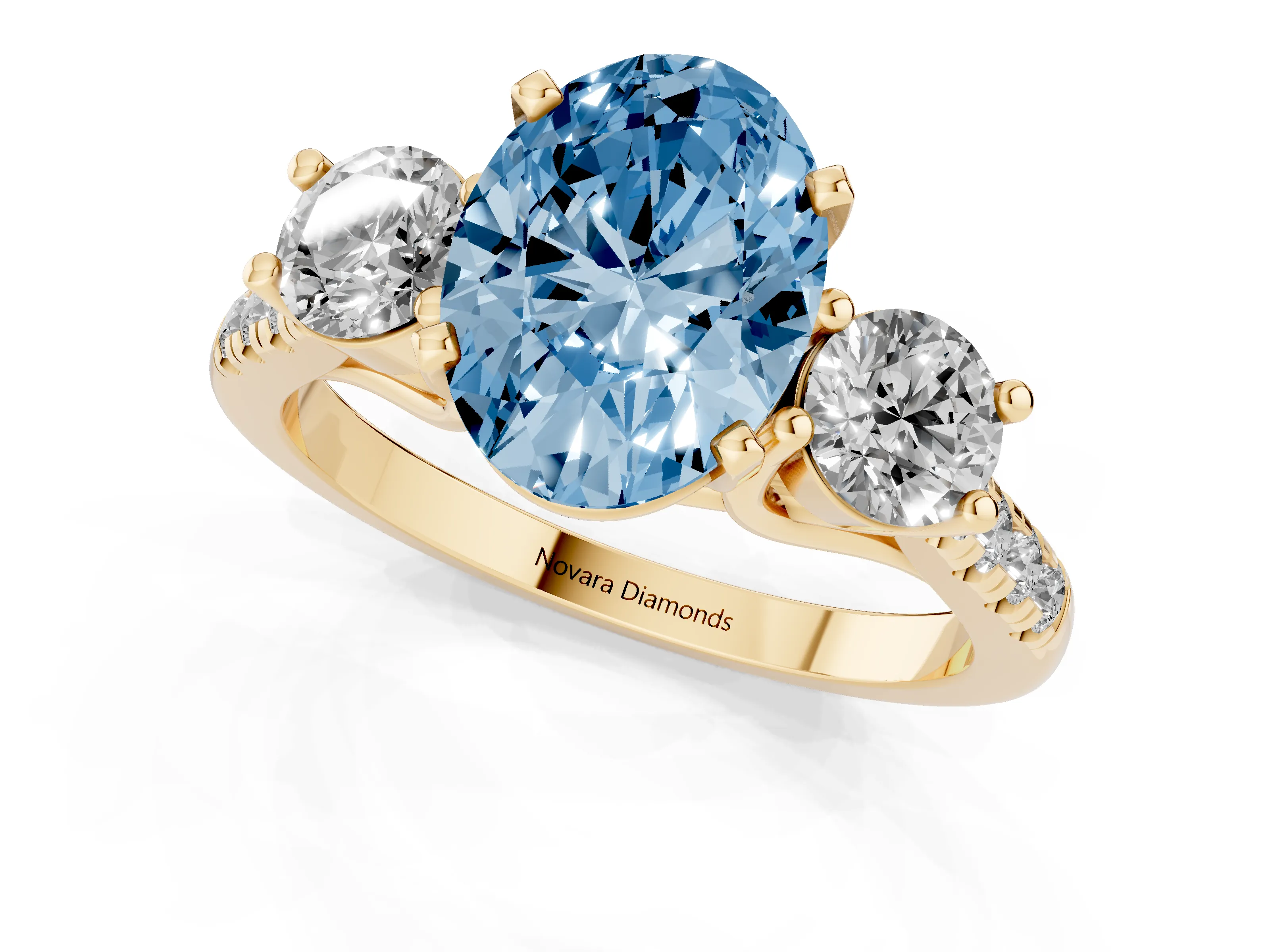 Fancy Blue Three-Stone Oval Cut Diamond Pavé Band Ring Set in Yellow gold with Prong-Set Trio