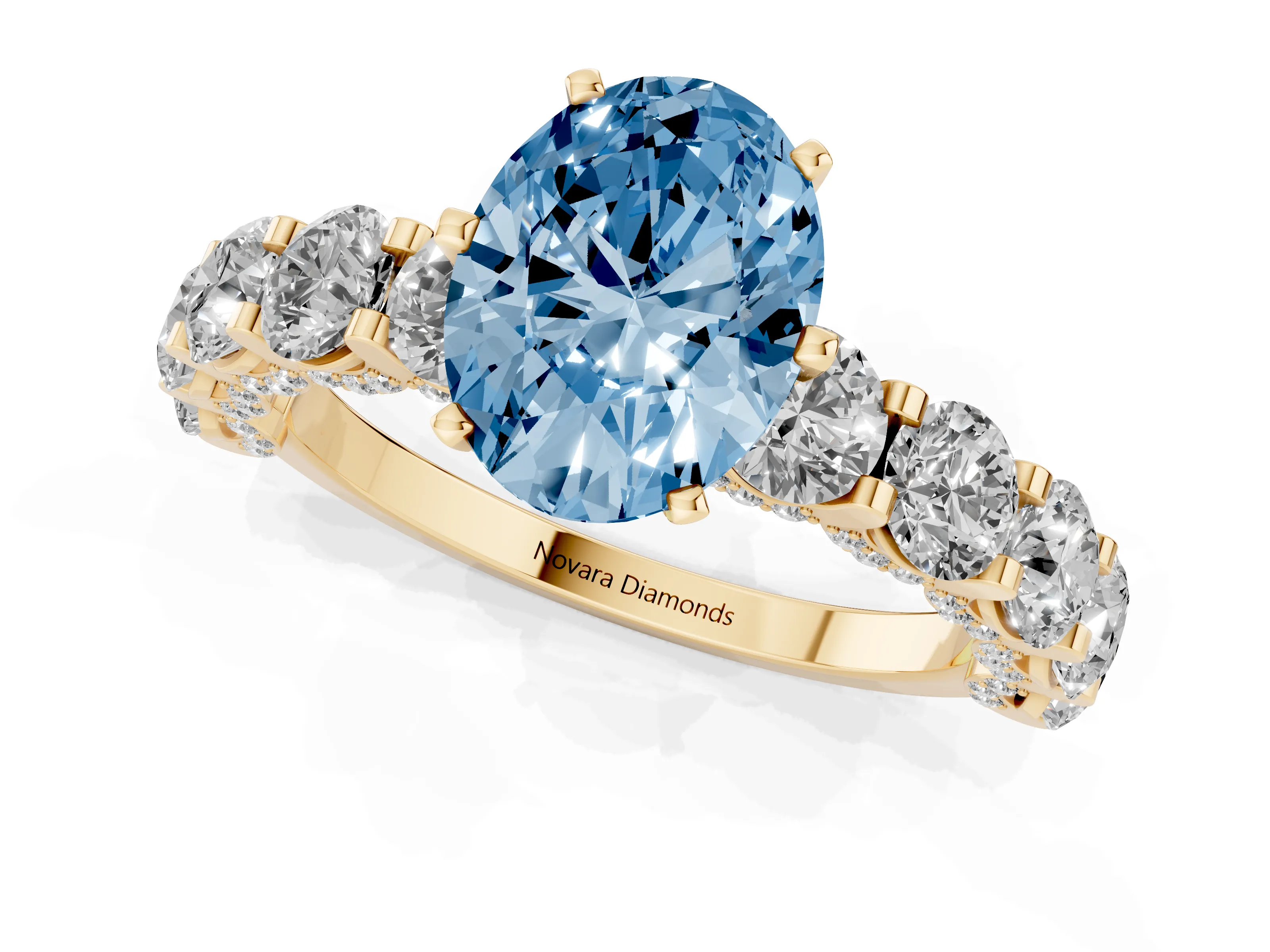 Fancy Blue Oval Cut Diamond Side Stone Ring Set in Yellow gold with Alternating Round and Oval Side Stones