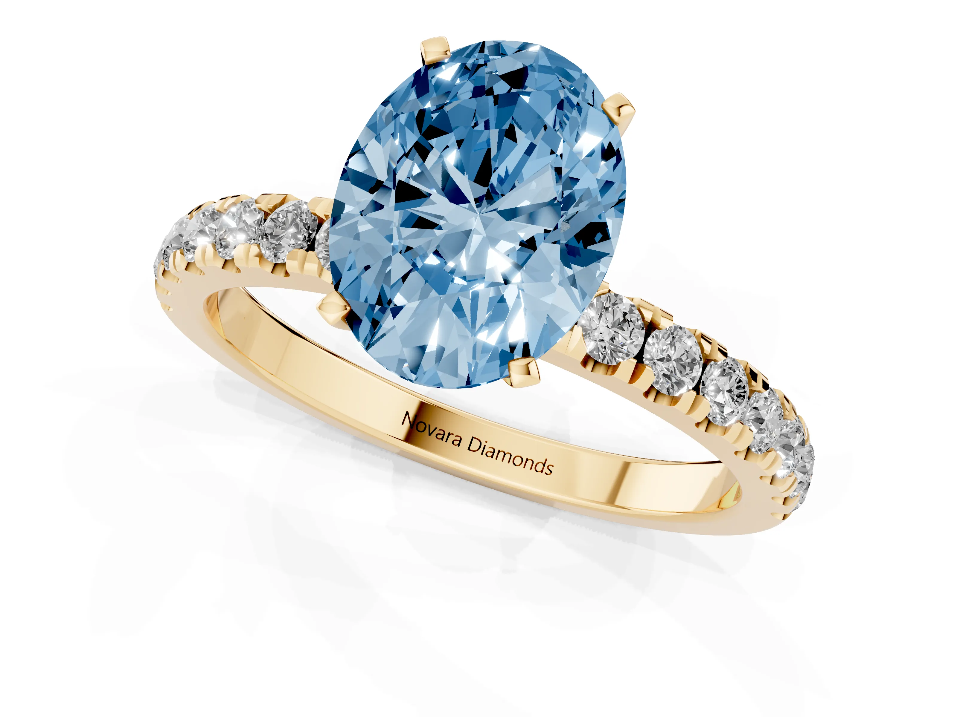 Fancy Blue Oval Cut Diamond Solitaire Ring Set in Yellow gold with Pavé Accents and Prong Setting