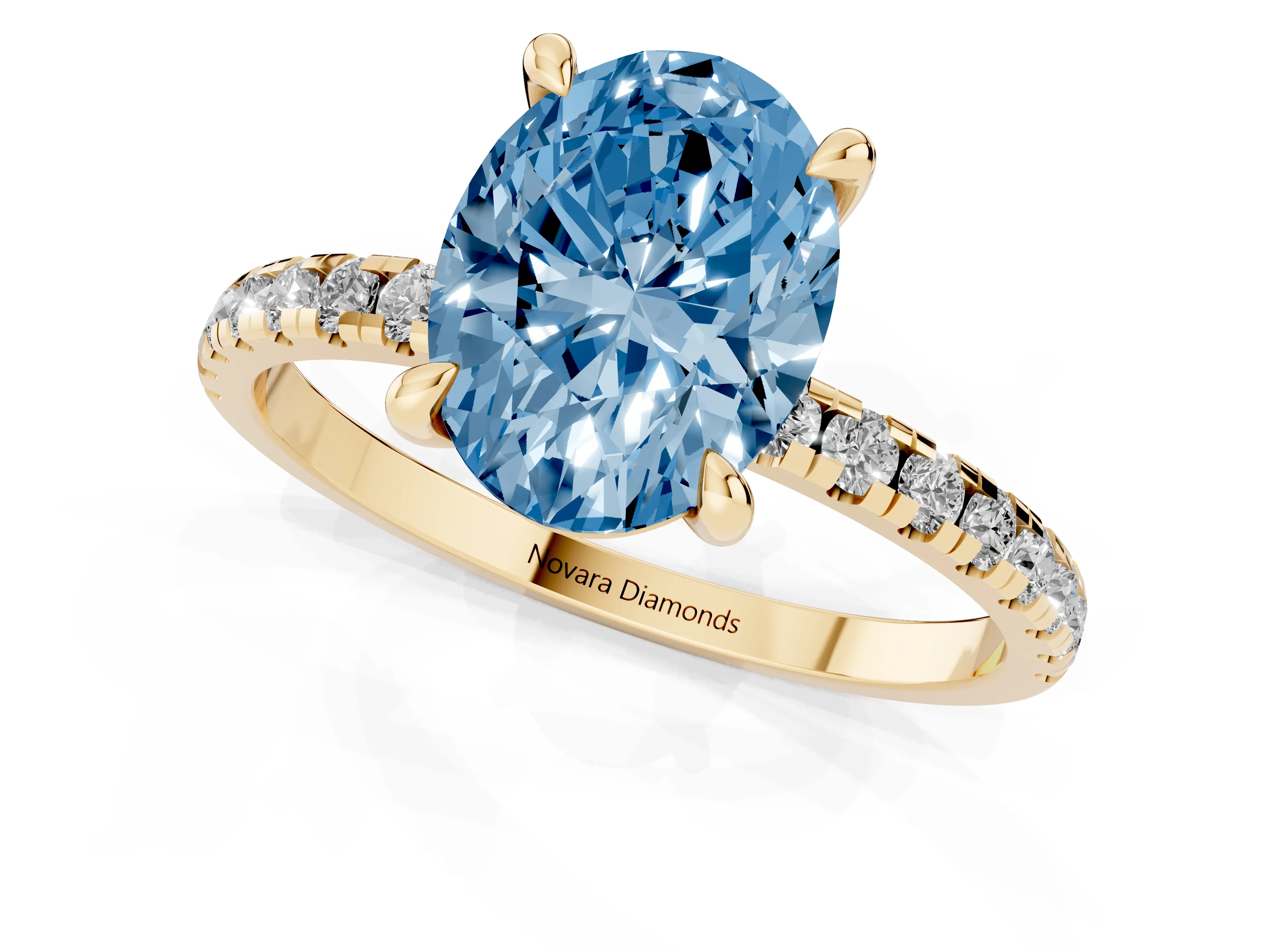 Fancy Blue Oval Cut Diamond Brilliant Solitaire Ring Set in Yellow gold with Pavé Band and Prong Setting