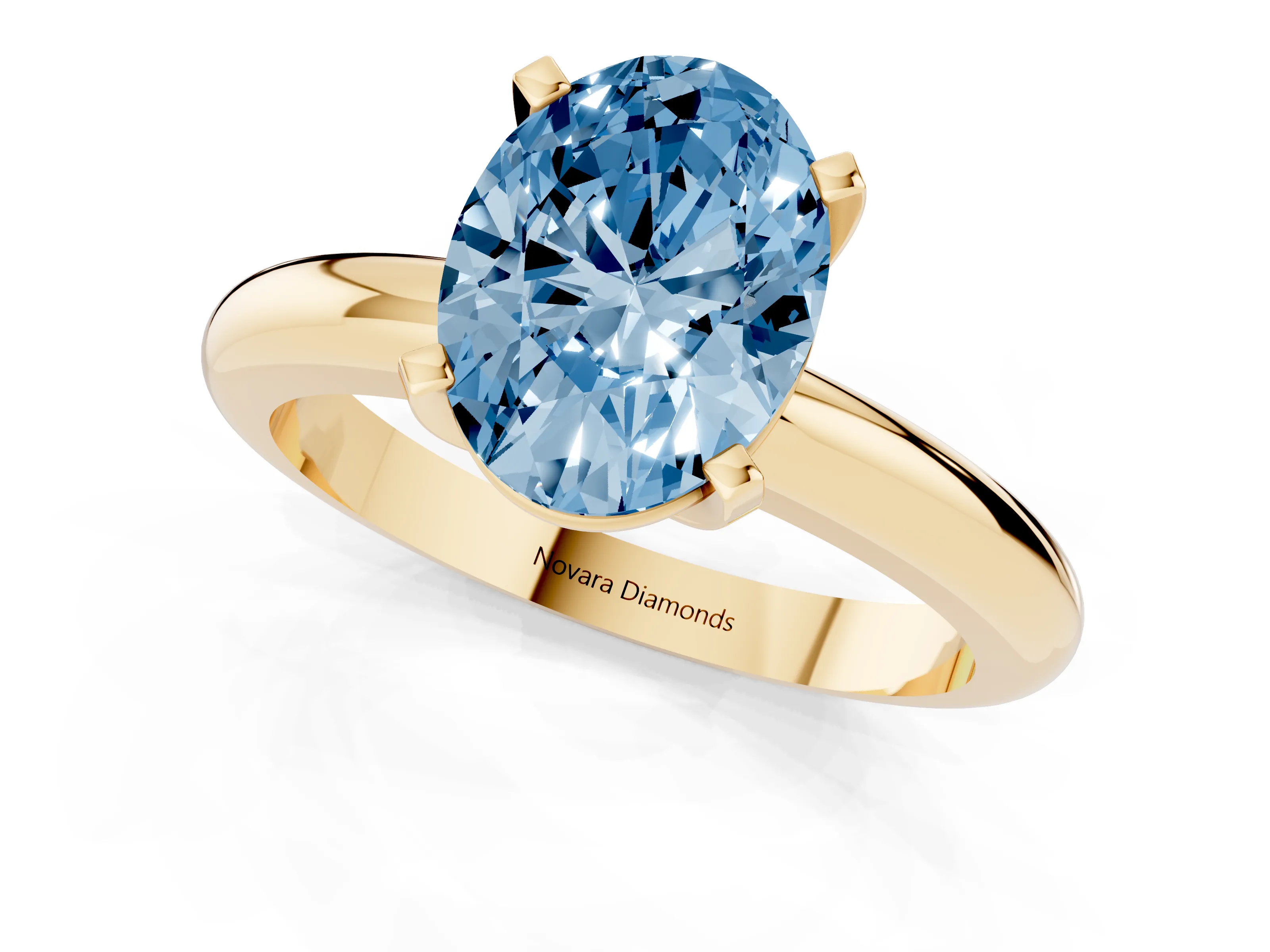 Fancy Blue Oval Cut Diamond Solitaire Engagement Ring Set in Yellow gold with Round Band and Prong Setting