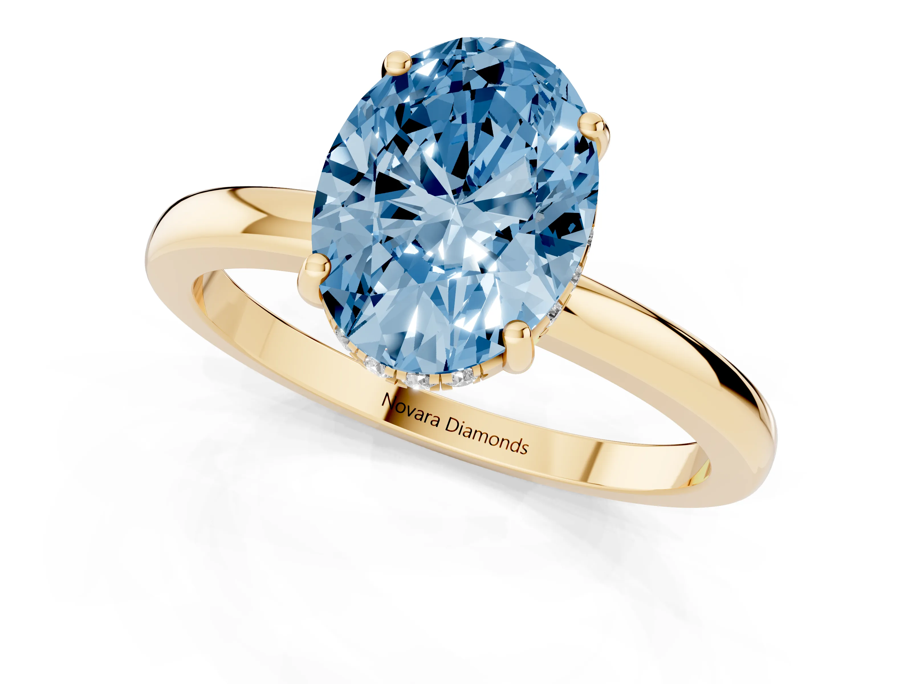 Fancy Blue Oval Cut Diamond Solitaire Ring Set in Yellow gold with Plain Band and Prong Setting