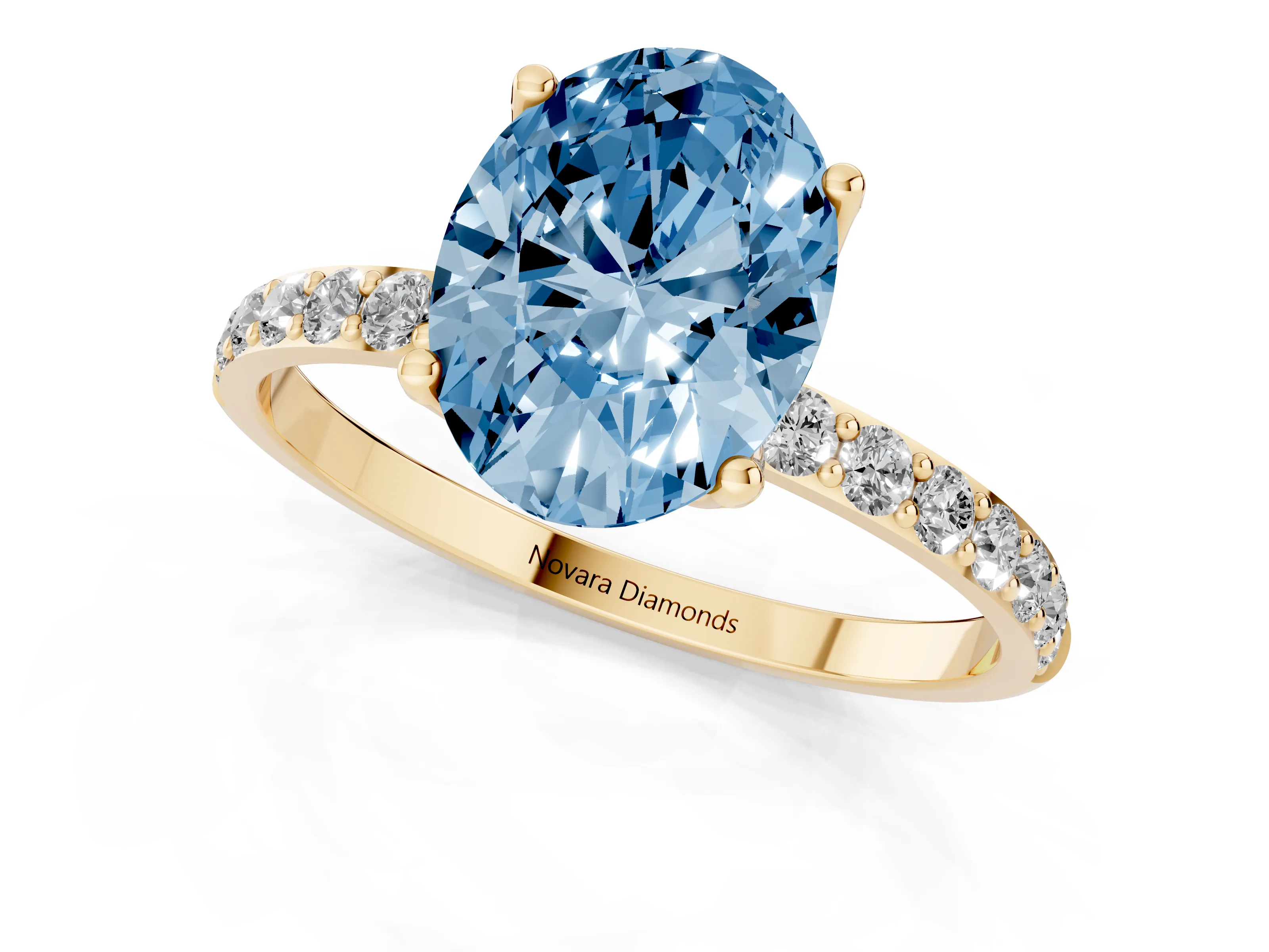 Fancy Blue Oval Cut Diamond Solitaire Engagement Ring Set in Yellow gold with Round Pavé Band and Prong Setting