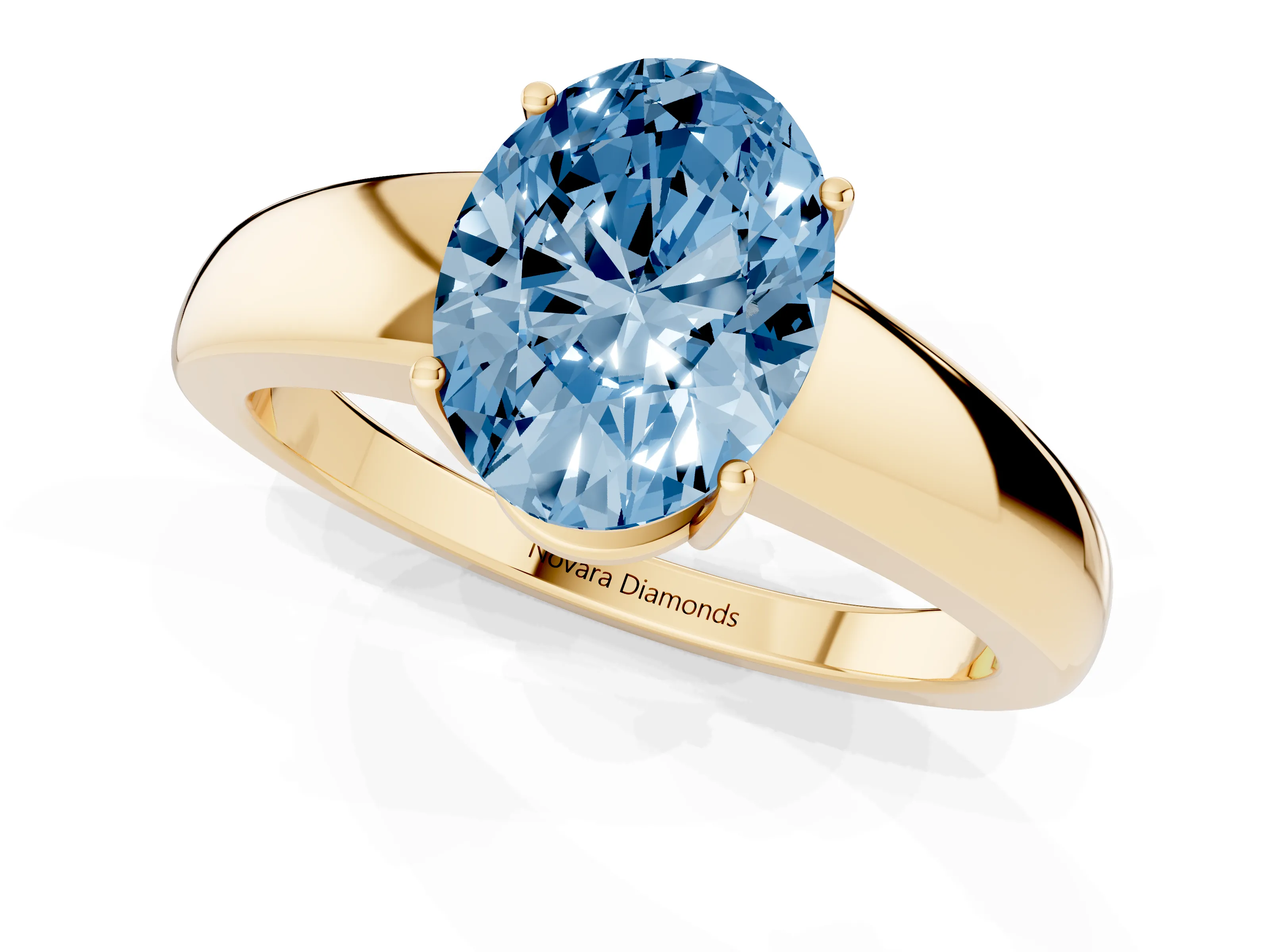 Fancy Blue Oval Cut Diamond Solitaire Ring Set in Yellow gold with Tapered Band and Prong Setting