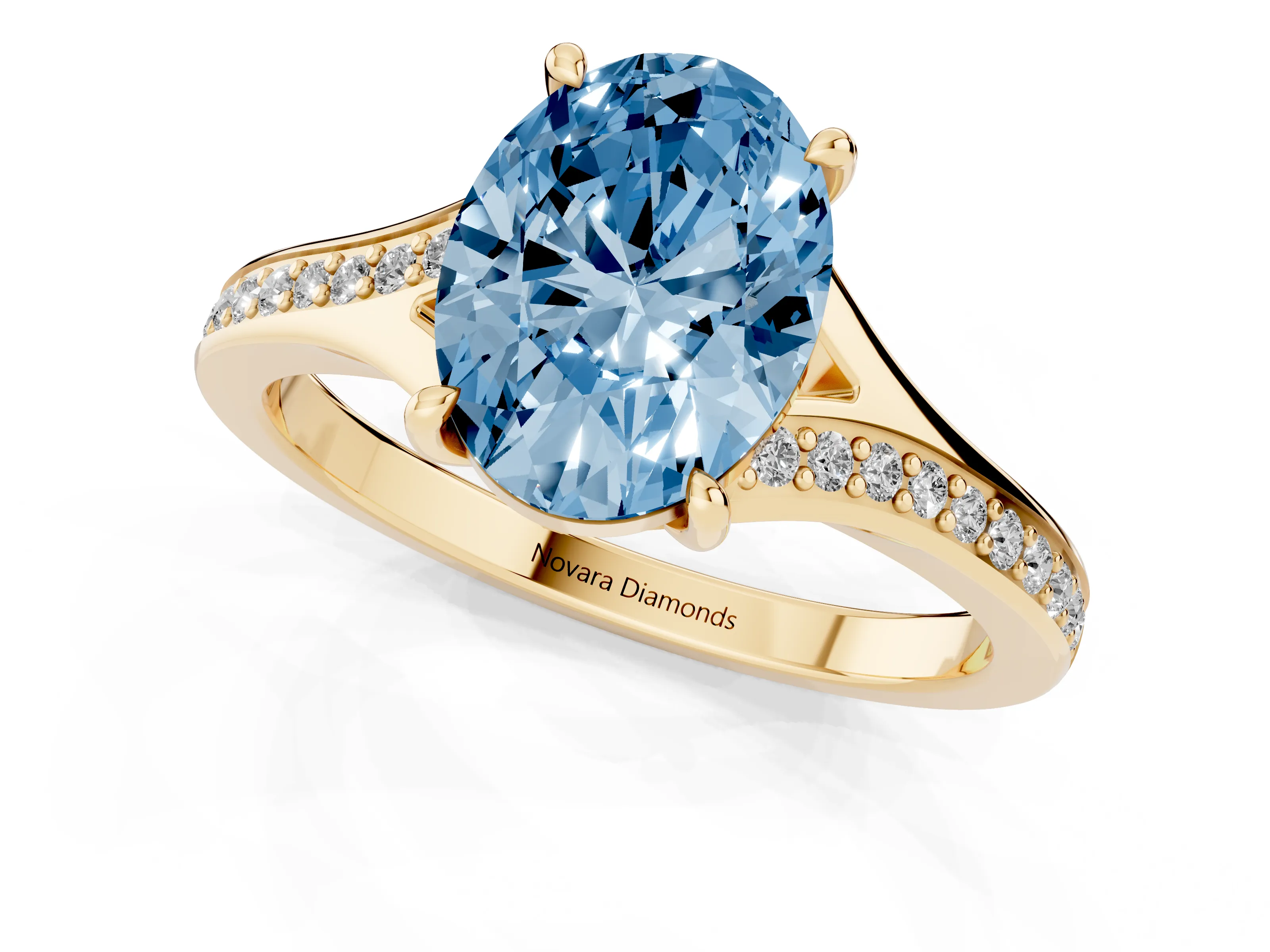 Fancy Blue Oval Cut Diamond Solitaire Ring Set in Yellow gold with Pavé Accent Band and Classic Prong Setting
