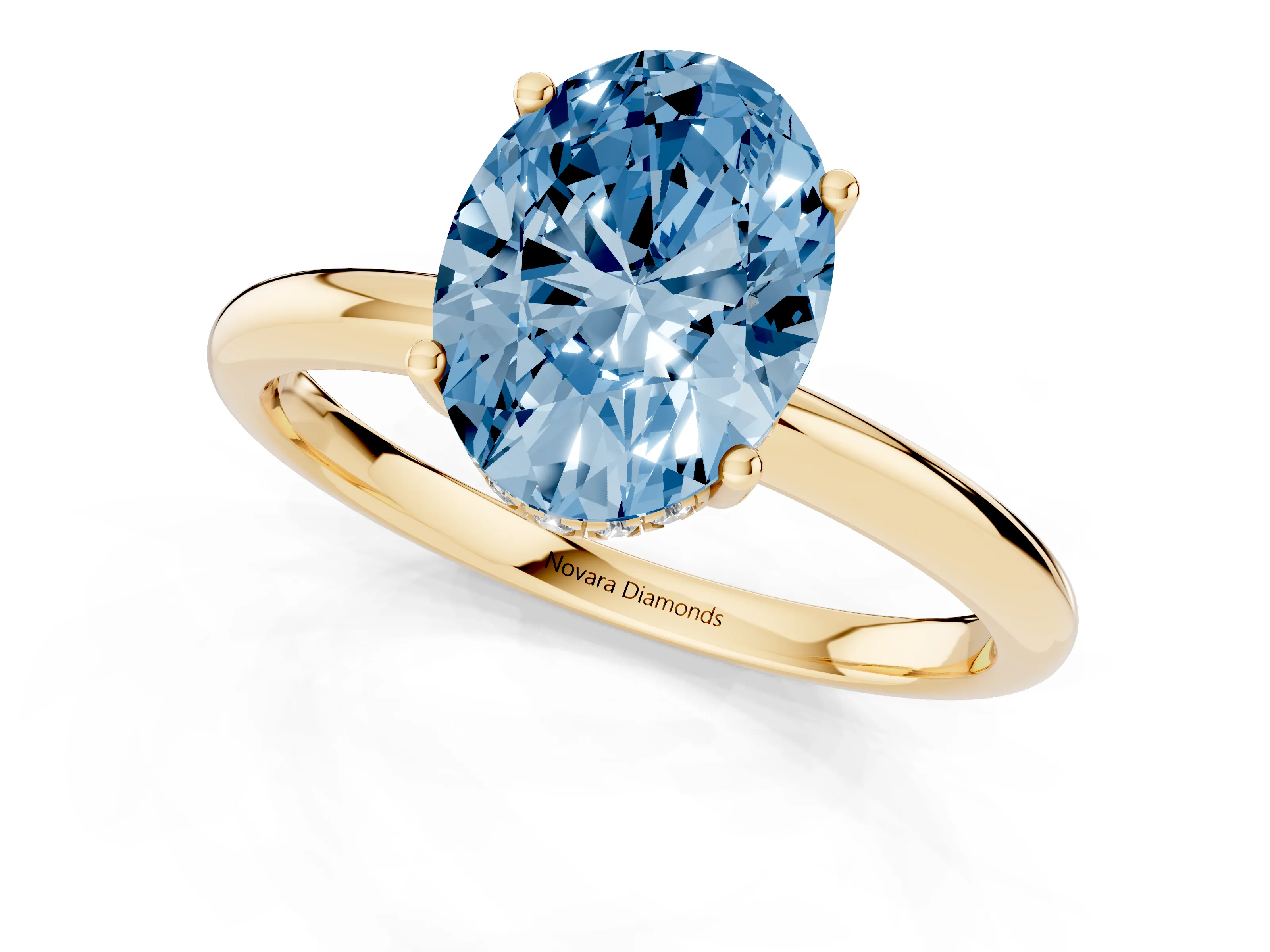 Fancy Blue Oval Cut Diamond Solitaire Engagement Ring Set in Yellow gold with Prong Setting and Polished Band