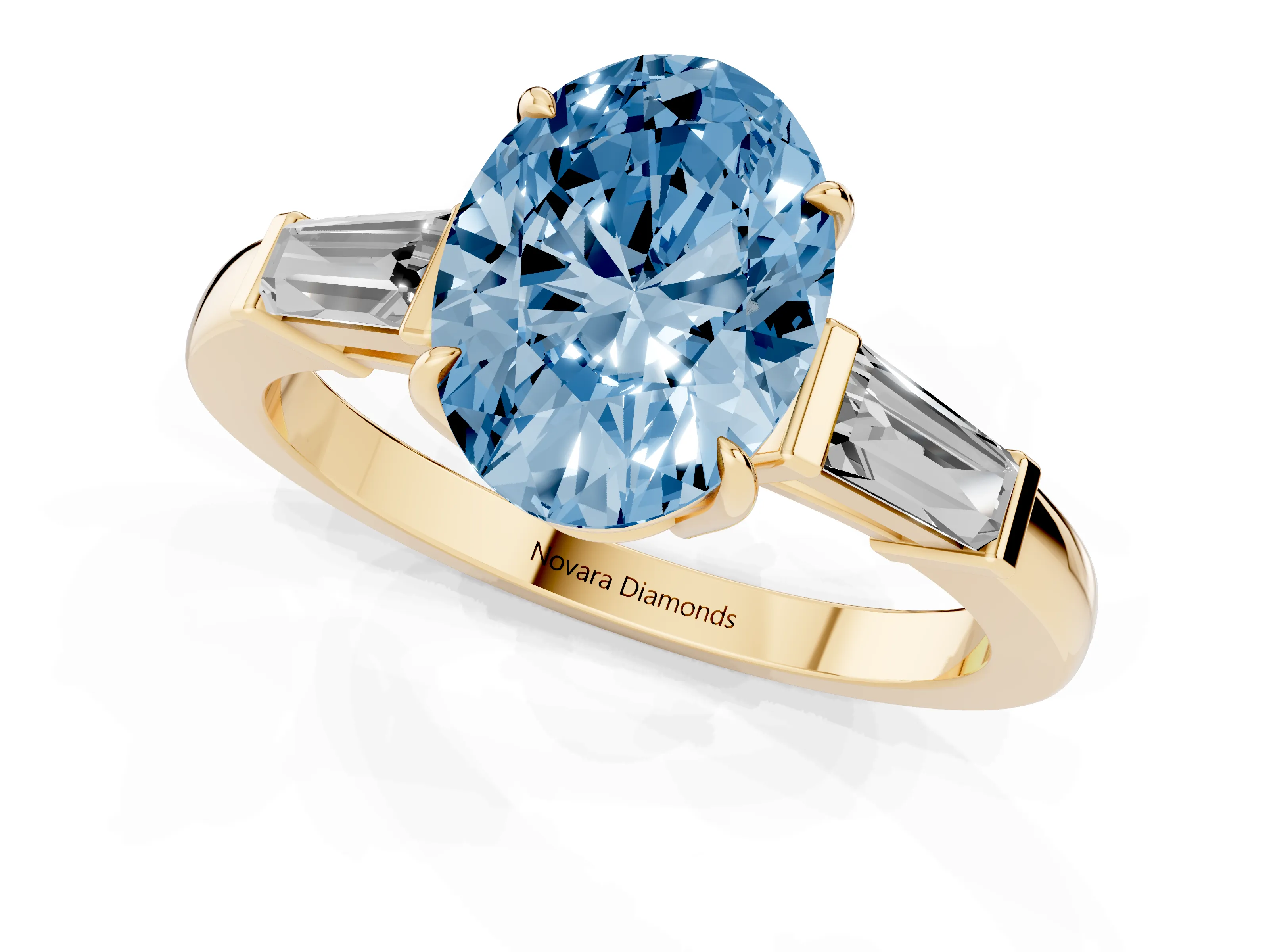 Fancy Blue Oval Cut Diamond Three-Stone Ring Set in Yellow gold with Tapered Baguette Side Stones and Prong Setting