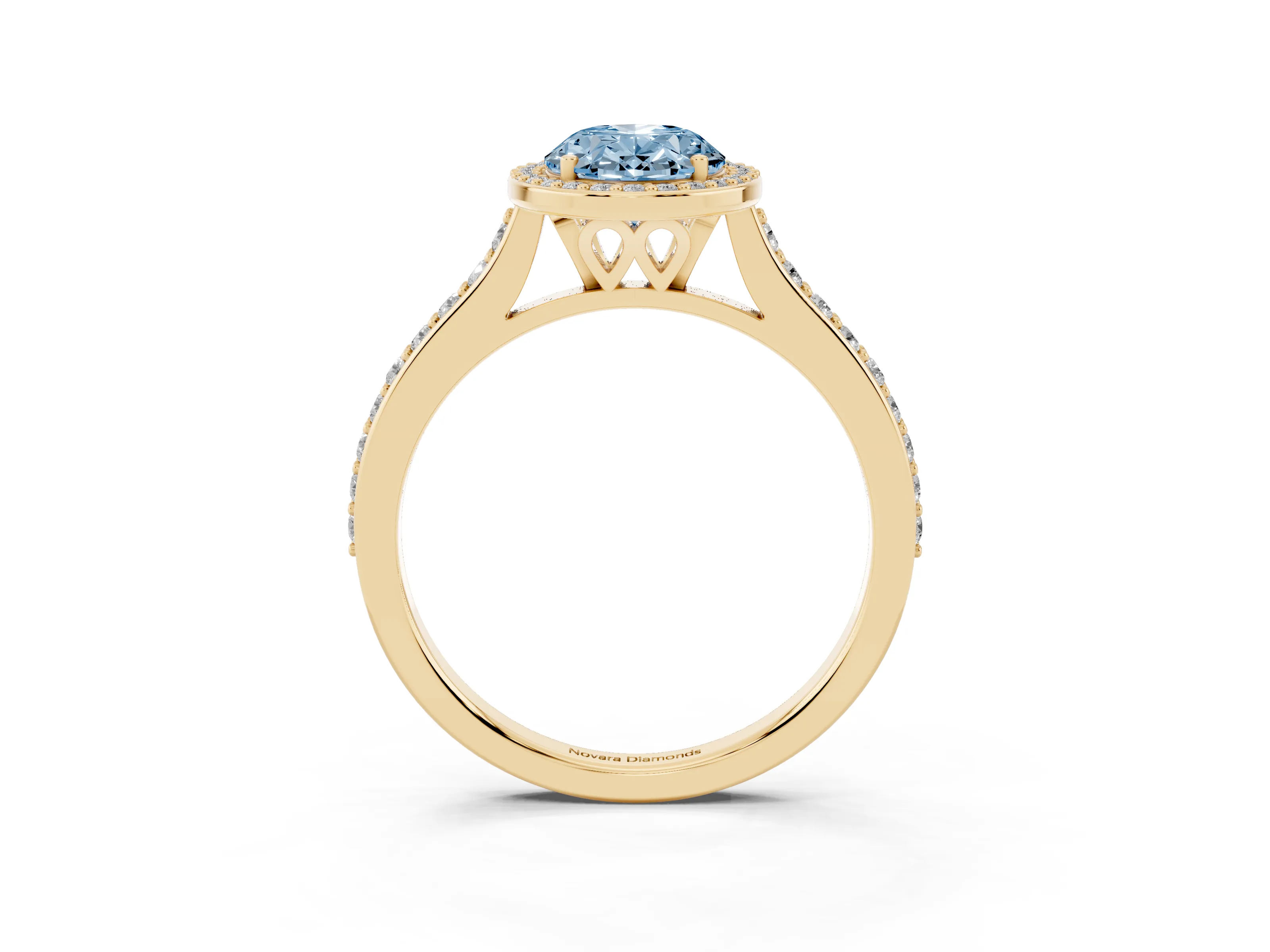 Fancy Blue Oval Cut Diamond Halo Engagement Ring Set in Yellow gold with Round Pavé Shoulders and Heart Gallery