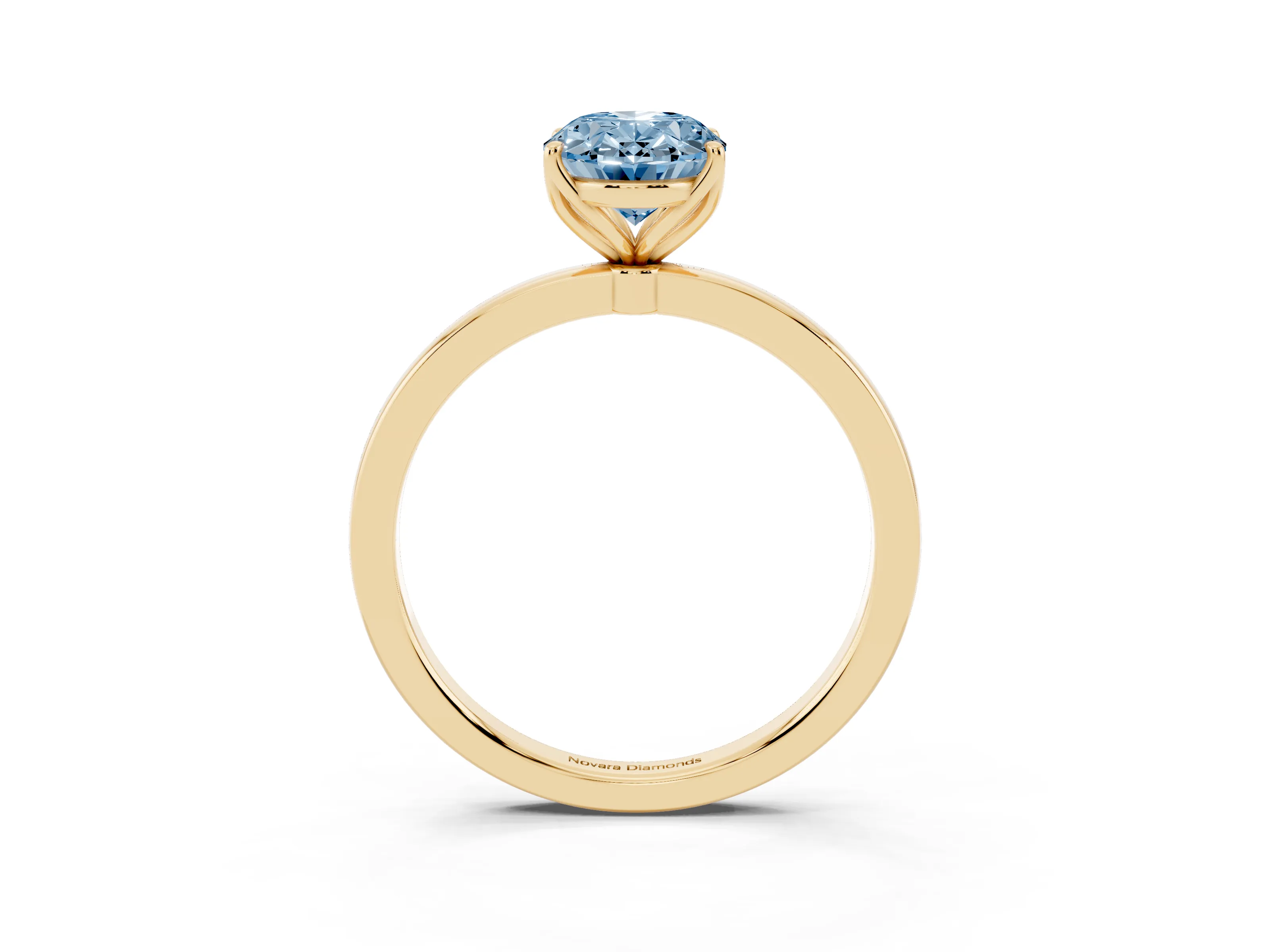 Fancy Blue Oval Cut Diamond Solitaire Ring Set in Yellow gold with Prong Setting and Thin Polished Band