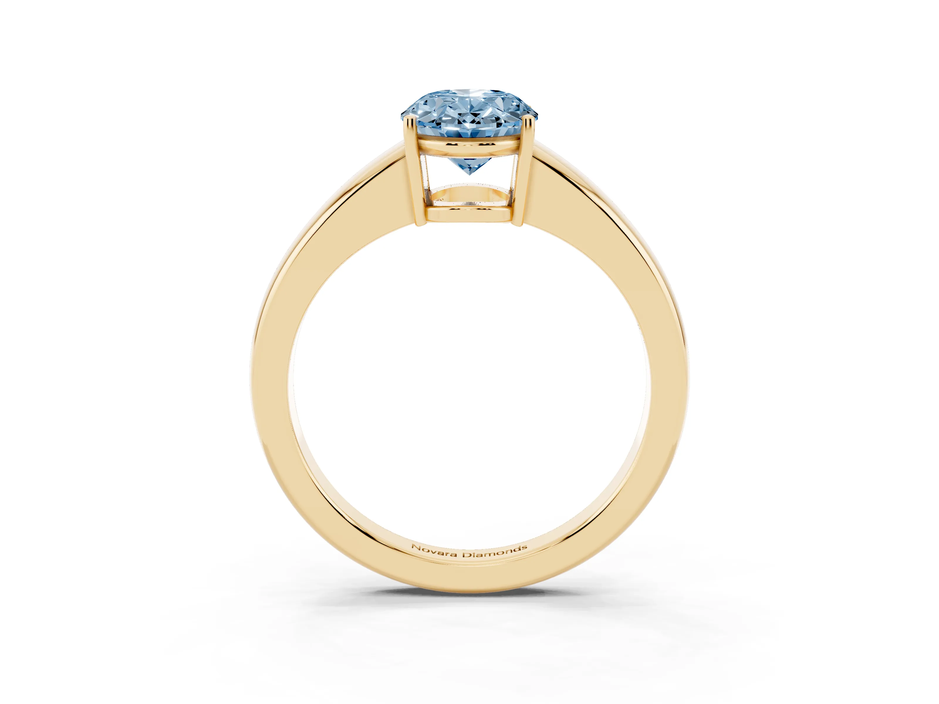 Fancy Blue Oval Cut Diamond Solitaire Ring Set in Yellow gold with Tapered Band and Prong Setting