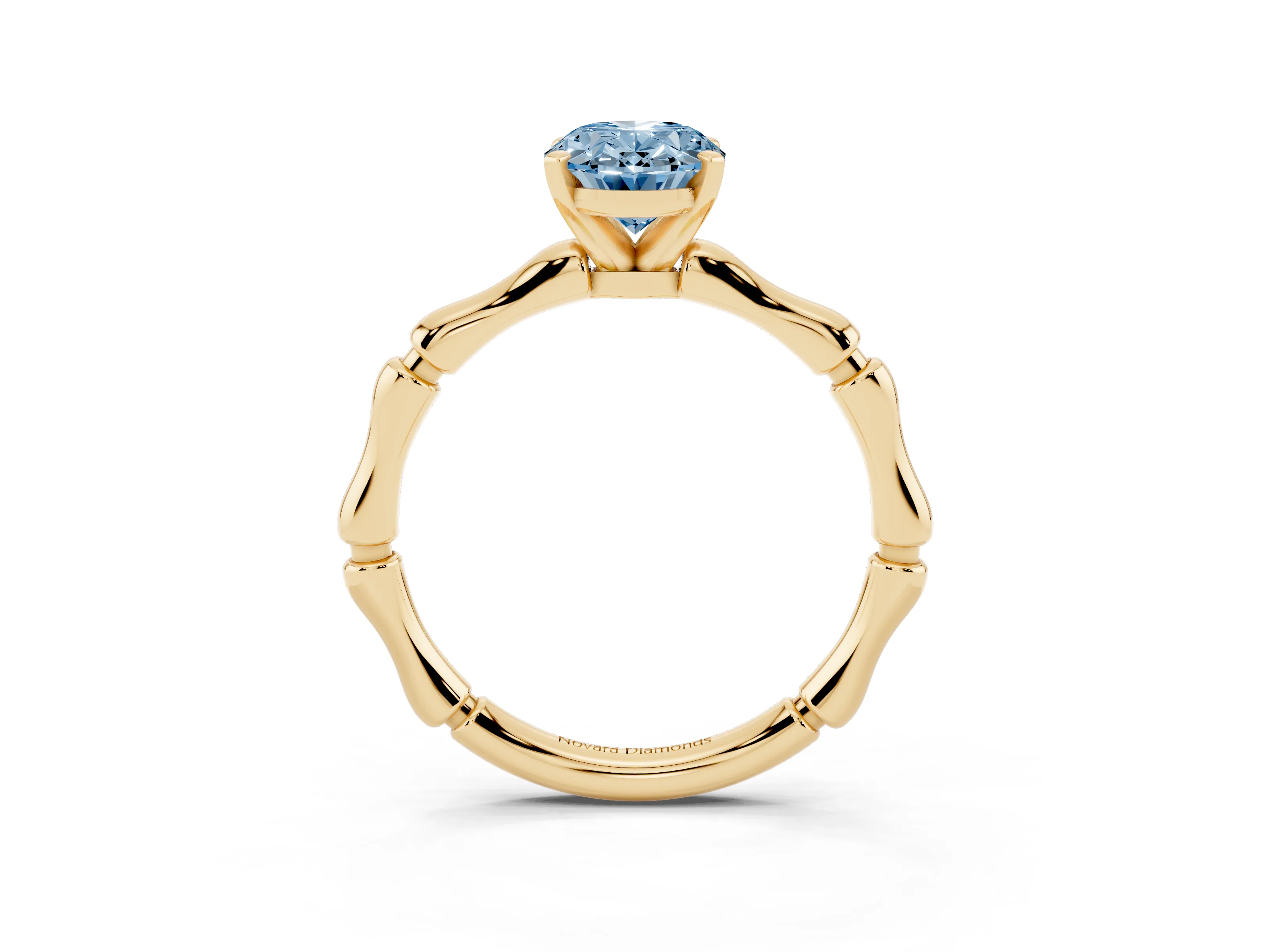 Fancy Blue Oval Cut Diamond Solitaire Ring Set in Yellow gold with Bamboo Band and Prong Setting