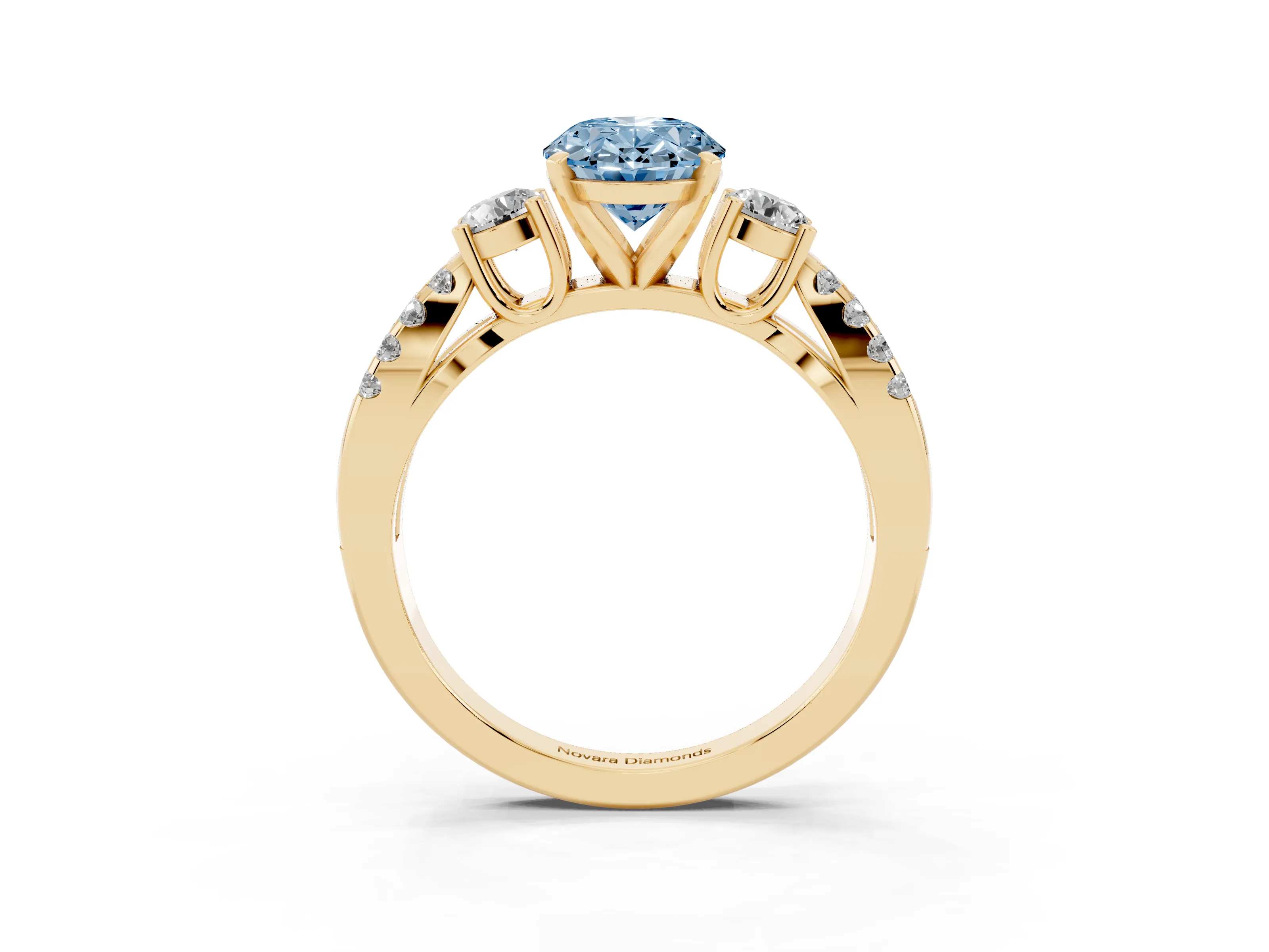 Fancy Blue Oval Cut Diamond Three-Stone Ring Set in Yellow gold with Pavé Split Shank and Prong Setting
