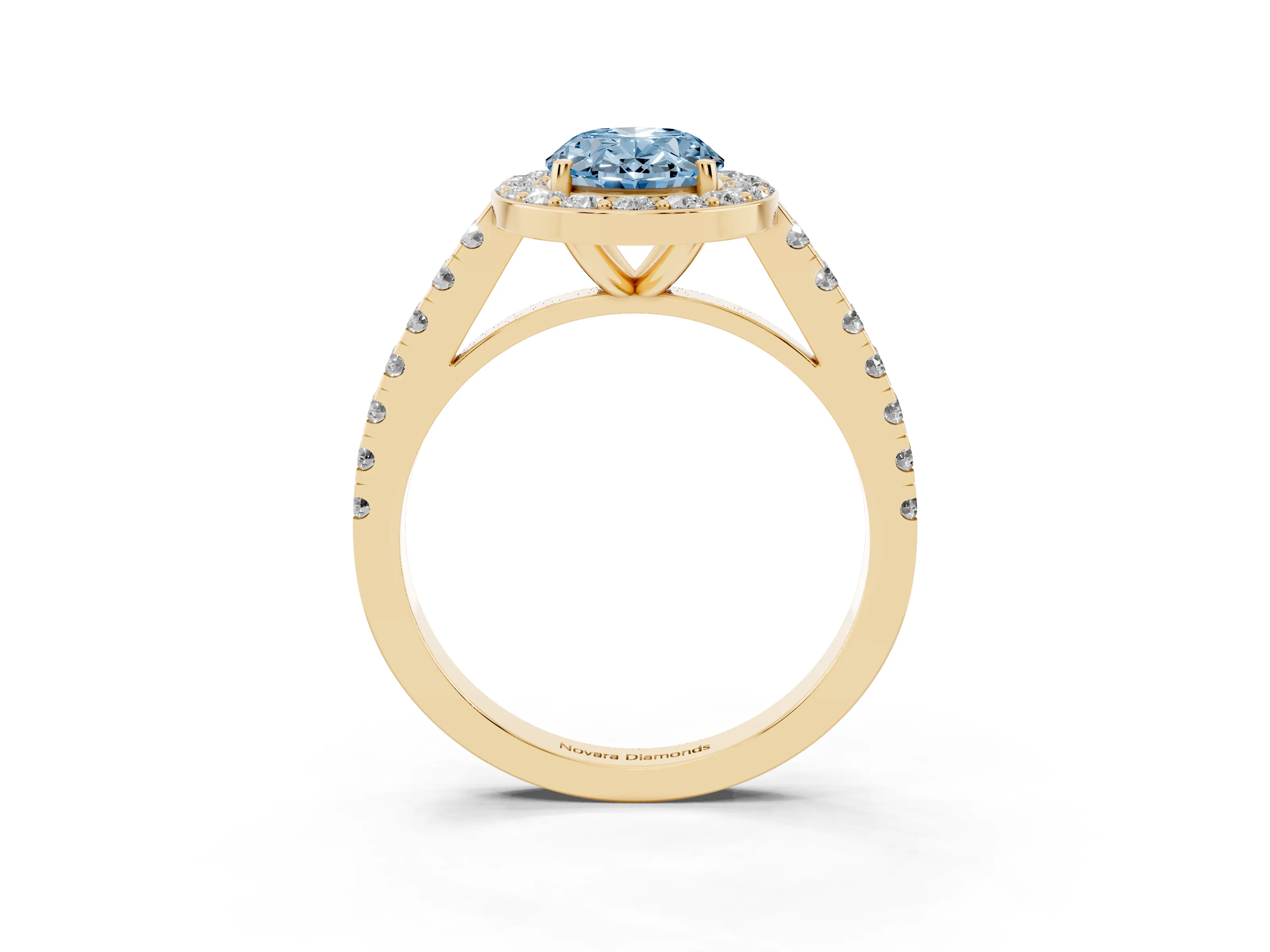 Fancy Blue Oval Cut Diamond Halo Ring Set in Yellow gold with Round Pavé Split Shank and Prong Setting