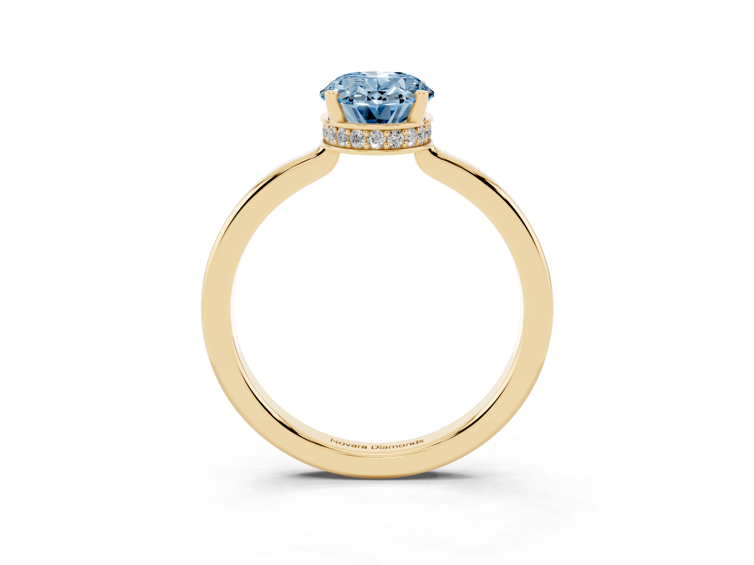 Fancy Blue Oval Cut Diamond Solitaire Engagement Ring Set in Yellow gold with Prong Setting on a Plain Band