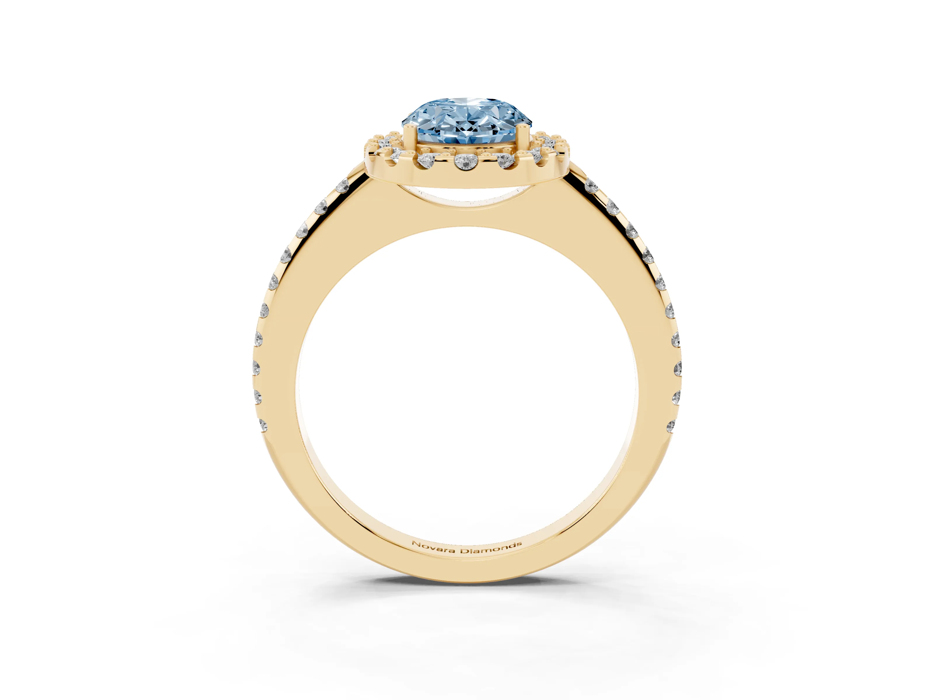 Fancy Blue Oval Cut Diamond Pavé Halo Ring Set in Yellow gold with Prong Setting