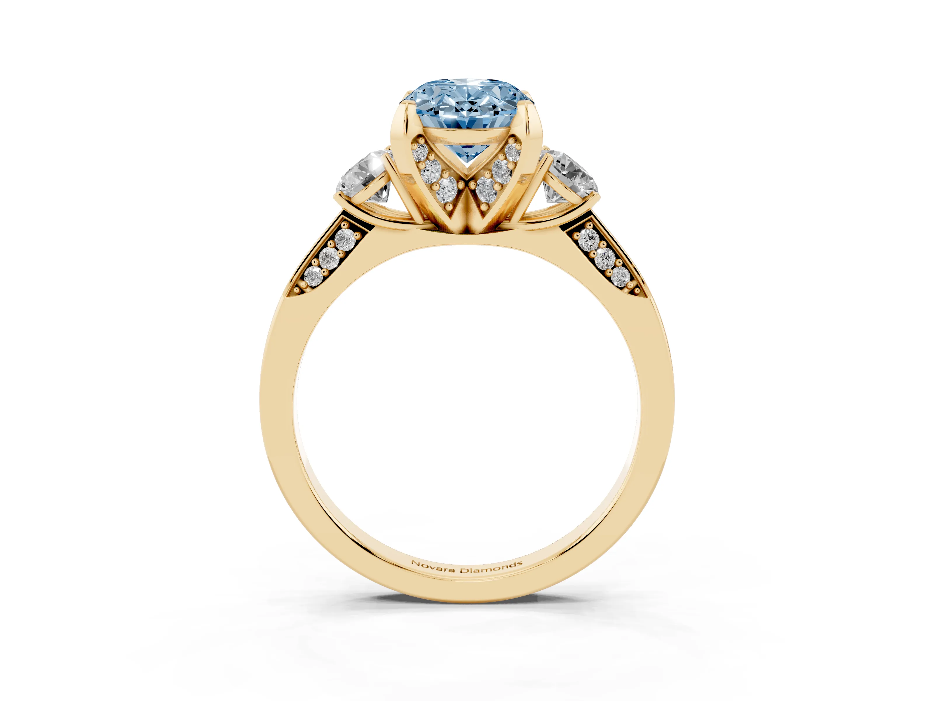 Fancy Blue Oval Cut Diamond Three-Stone Ring Set in Yellow gold with Pavé Band and Smaller Side Stones