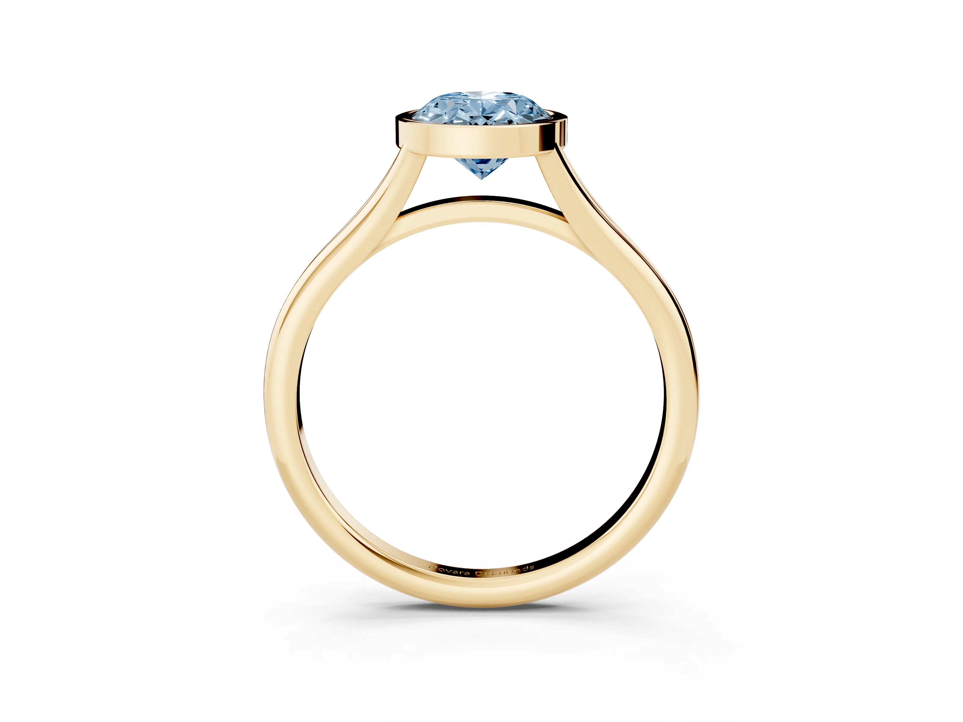 Fancy Blue Bezel Set Oval Cut Diamond Solitaire Ring Set in Yellow gold with Tapered Band