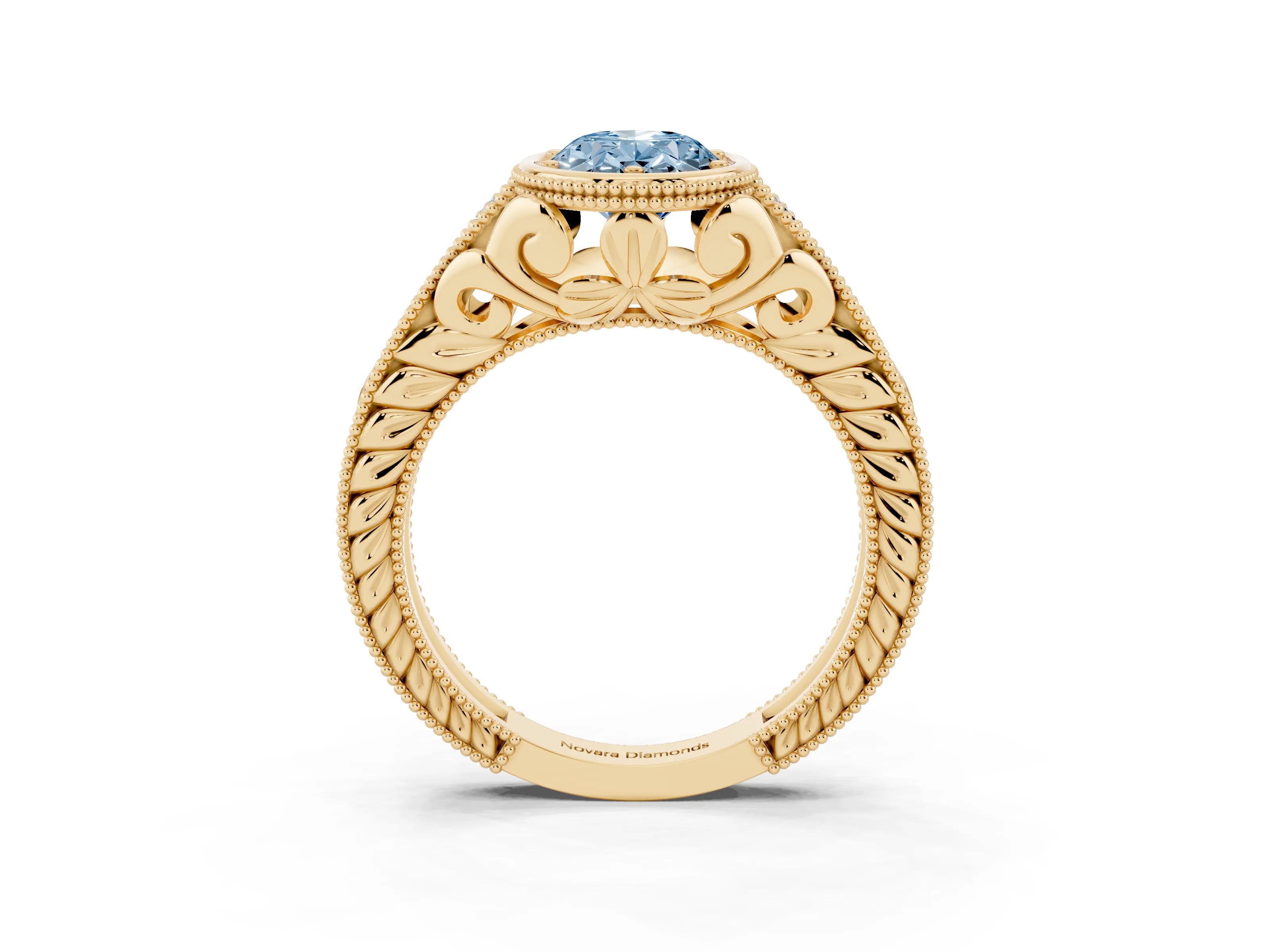 Fancy Blue Bezel Set Oval Cut Diamond Milgrain Pavé Engagement Ring Set in Yellow gold