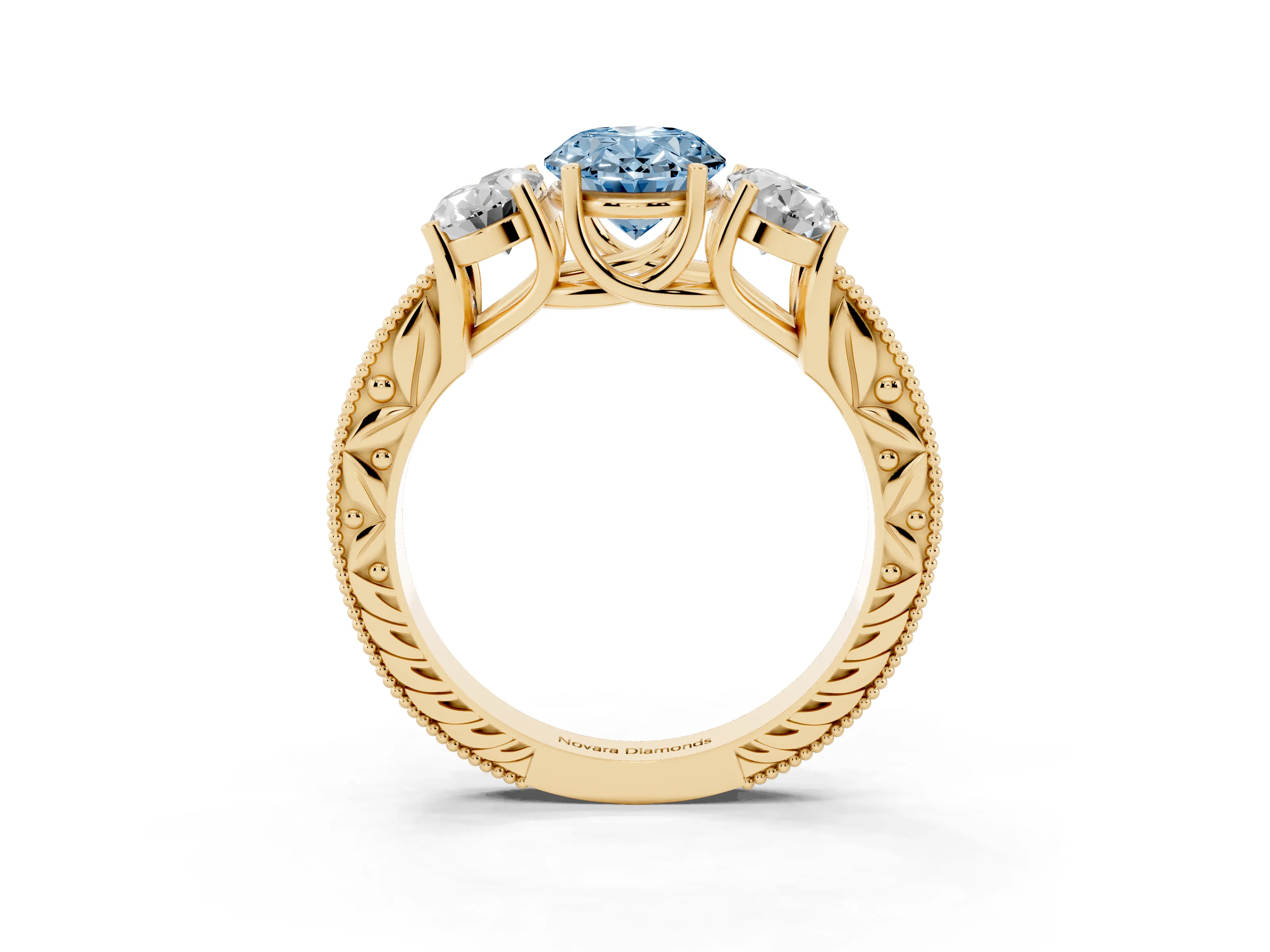 Fancy Blue Oval Cut Diamond Three-Stone Engagement Ring Set in Yellow gold with Milgrain Pavé Band