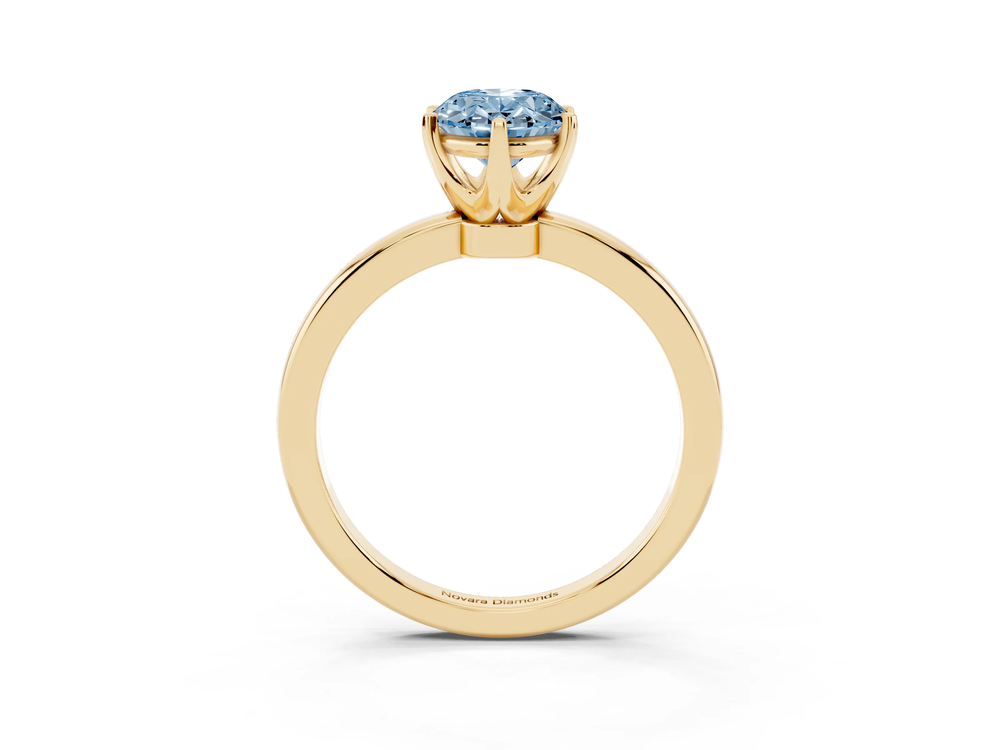 Fancy Blue Oval Cut Diamond Solitaire Ring Set in Yellow gold with Raised Prong Setting on a Classic Band