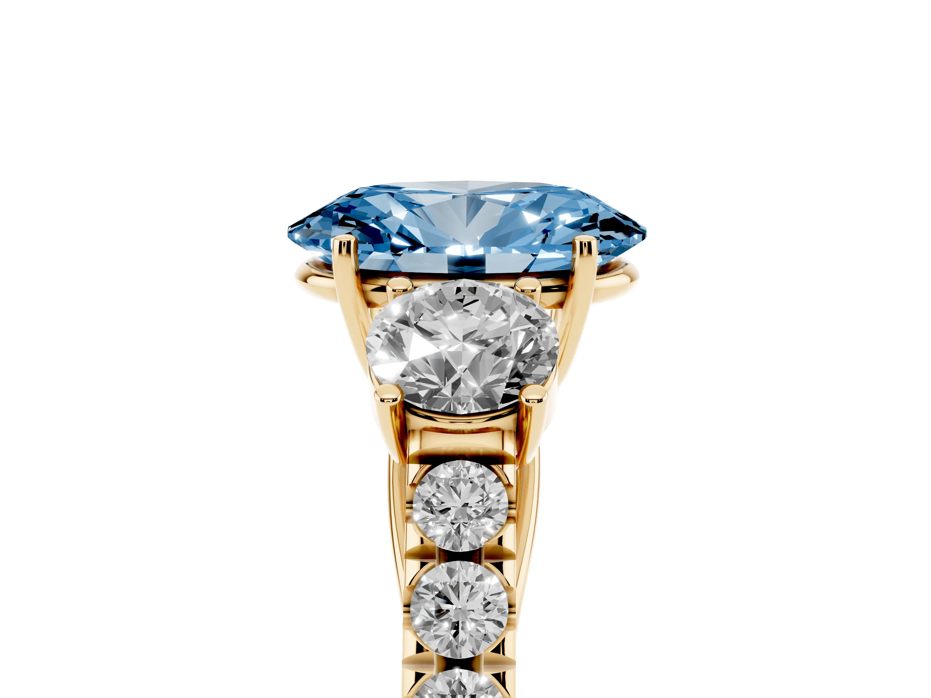 Fancy Blue Oval Cut Diamond Three-Stone Ring Set in Yellow gold with Round Side Stones and Delicate Pavé Band