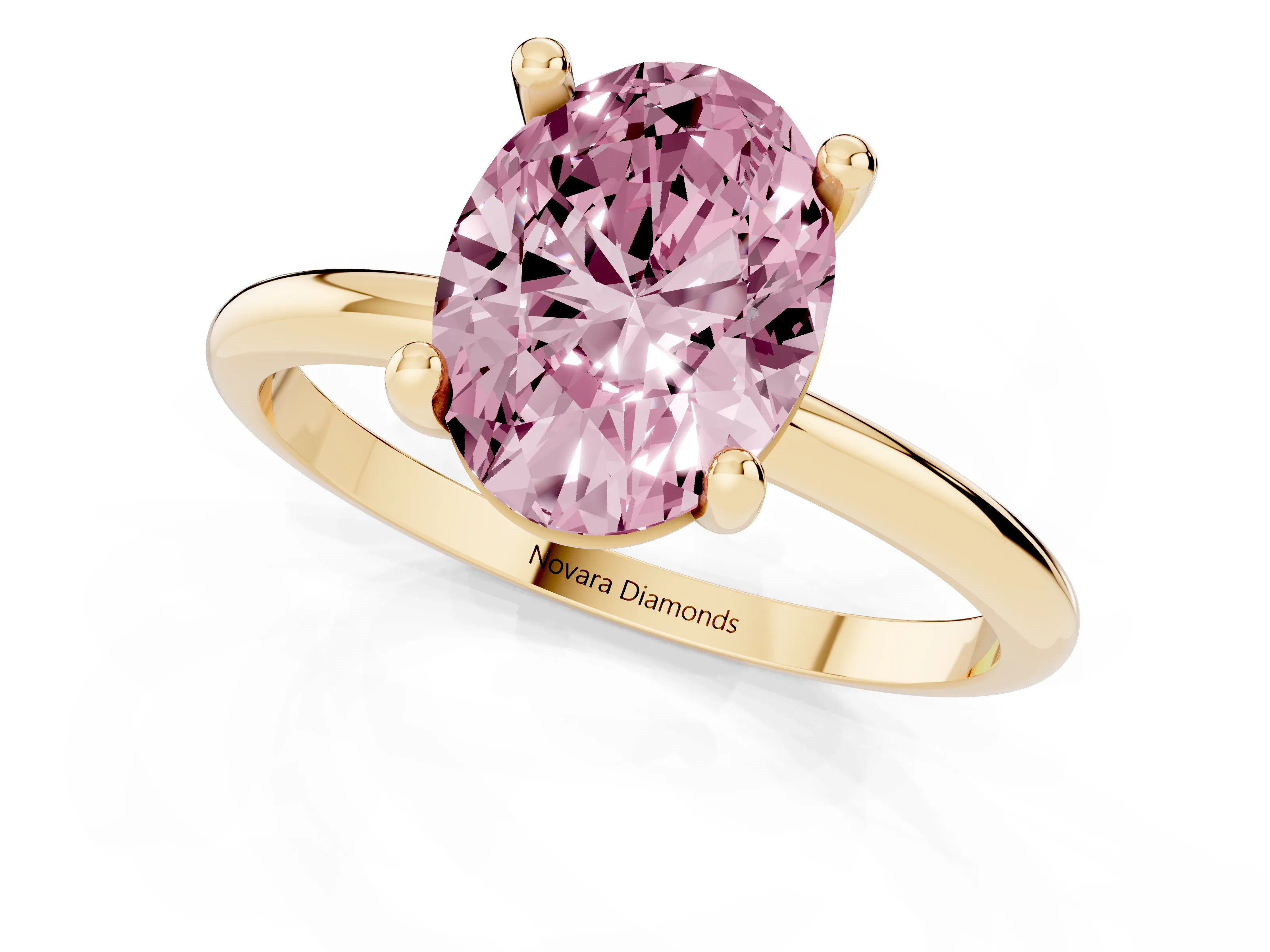 Fancy Pink Oval Cut Diamond Solitaire Ring Set in Yellow gold with Secure Prong Setting on a Classic Band