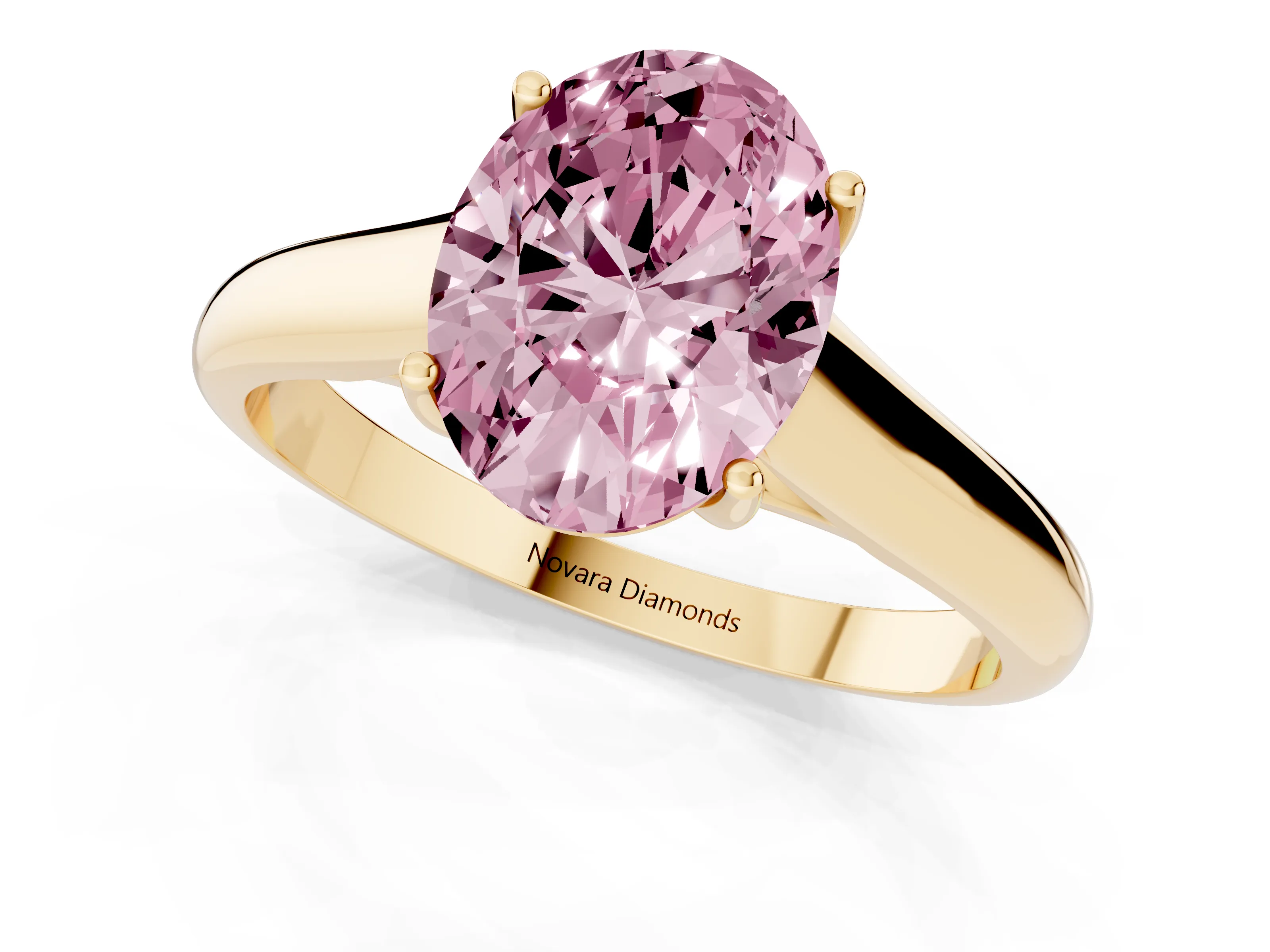 Fancy Pink Oval Cut Diamond Solitaire Engagement Ring Set in Yellow gold with Subtly Tapered Band and Prong Setting