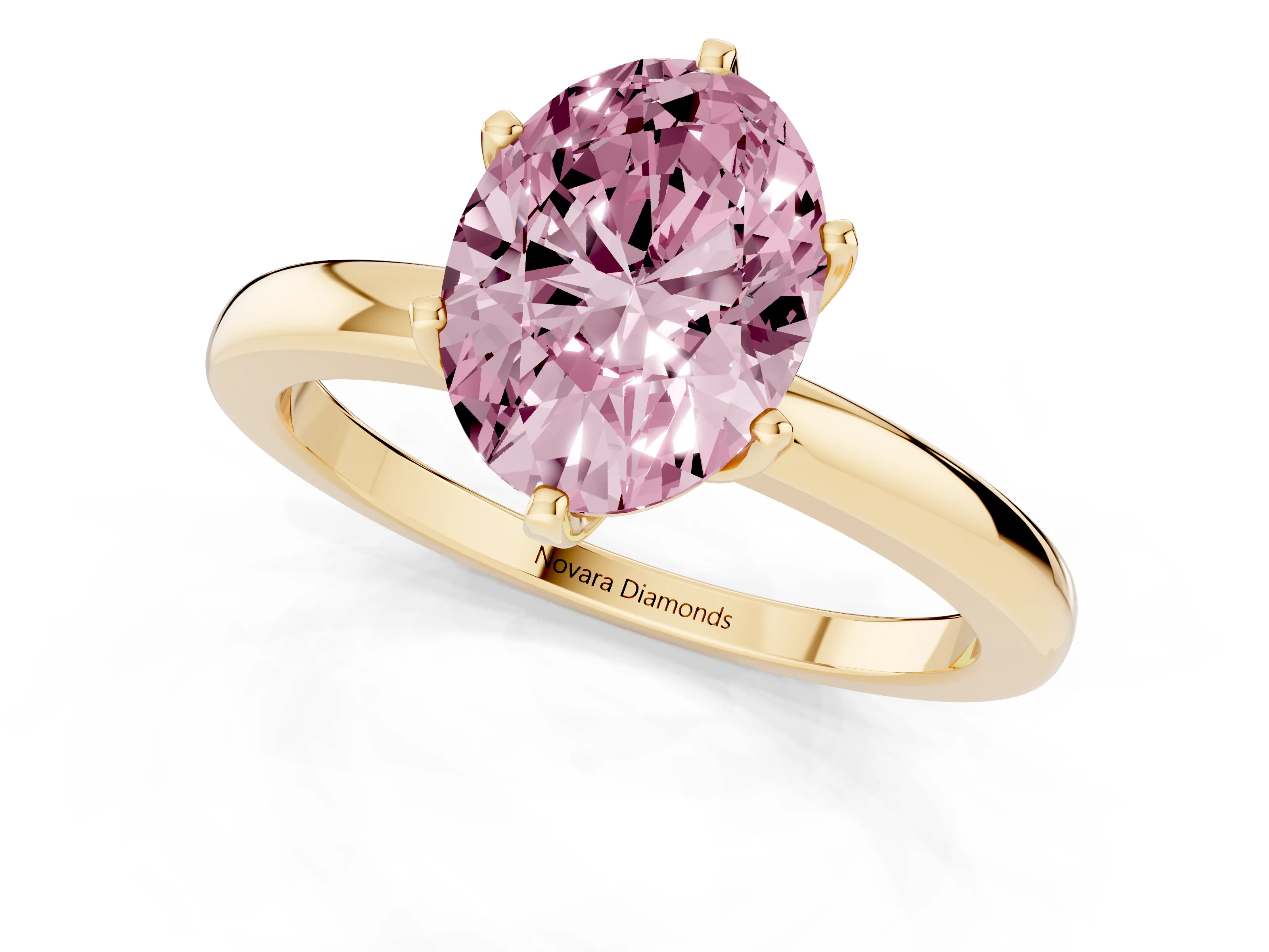 Fancy Pink Oval Cut Diamond Solitaire Ring Set in Yellow gold with Raised Prong Setting on a Classic Band