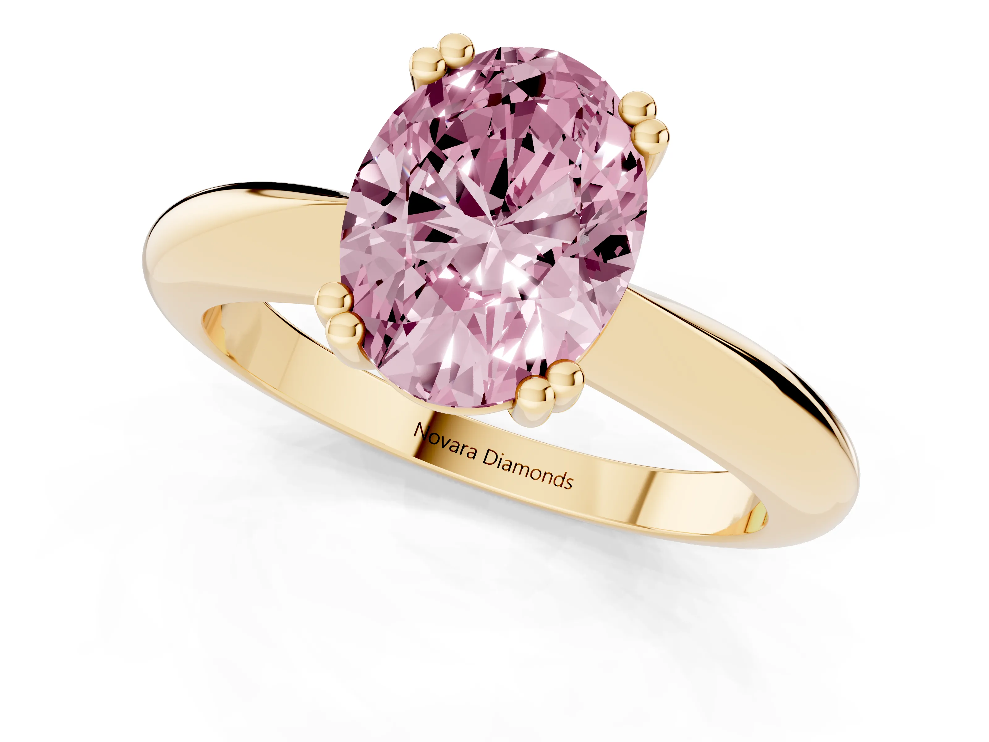 Fancy Pink Oval Cut Diamond Solitaire Engagement Ring Set in Yellow gold with Tapered Band and Prong Setting