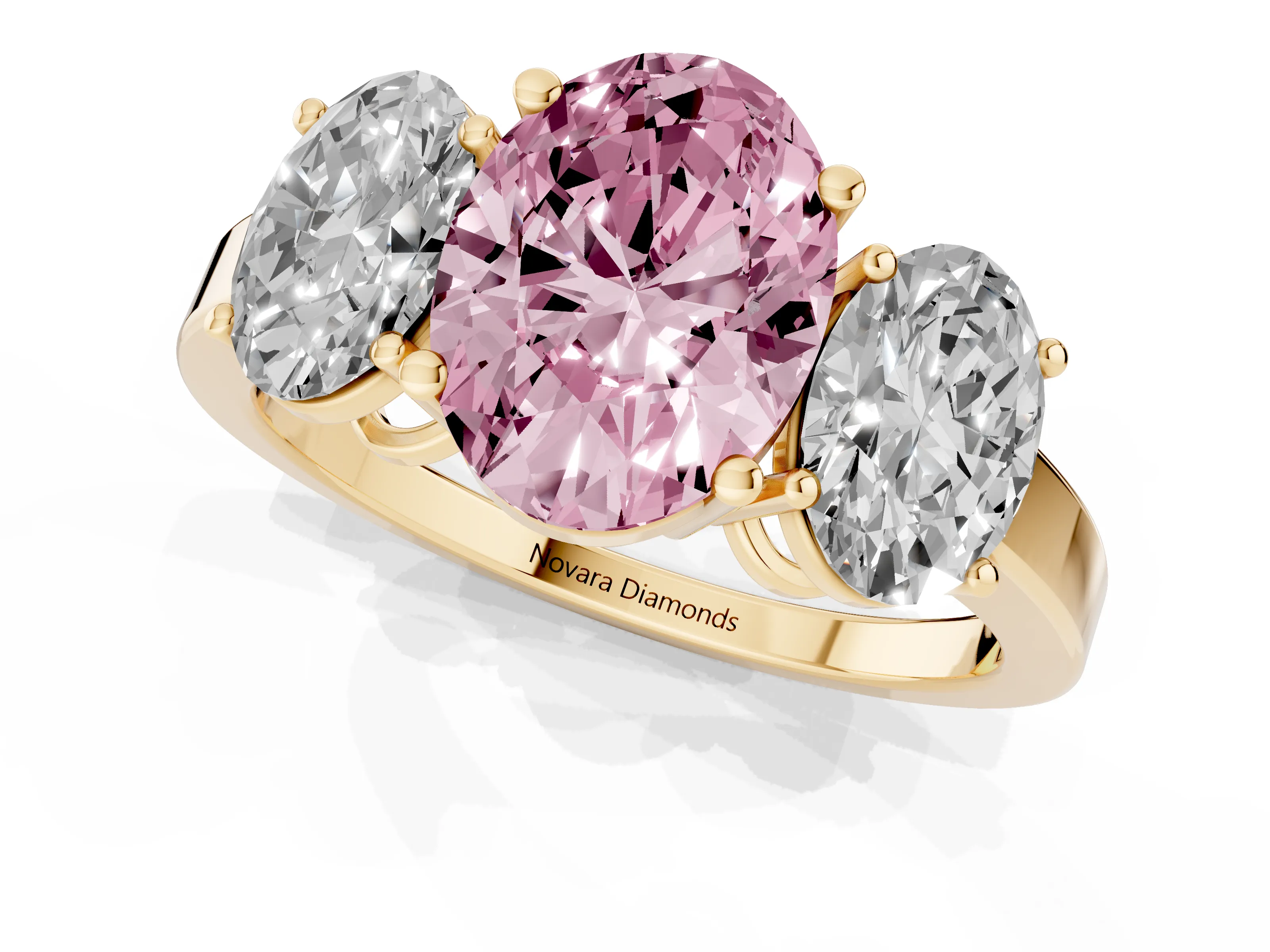 Fancy Pink Oval Cut Diamond Three-Stone Engagement Ring Set in Yellow gold with Flat Band