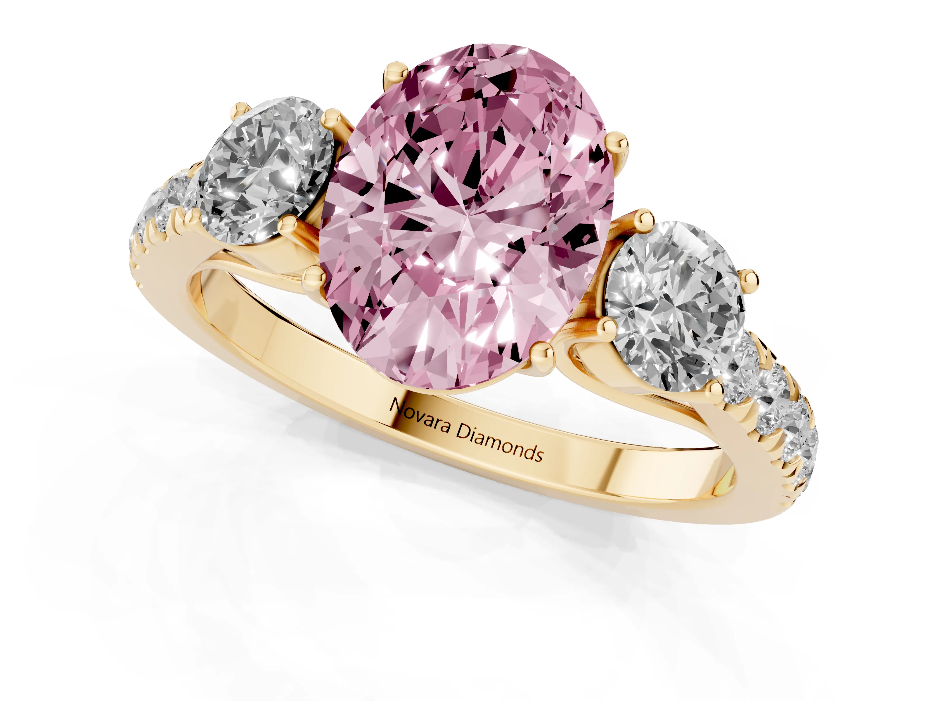 Fancy Pink Oval Cut Diamond Three-Stone Ring Set in Yellow gold with Round Side Stones and Delicate Pavé Band