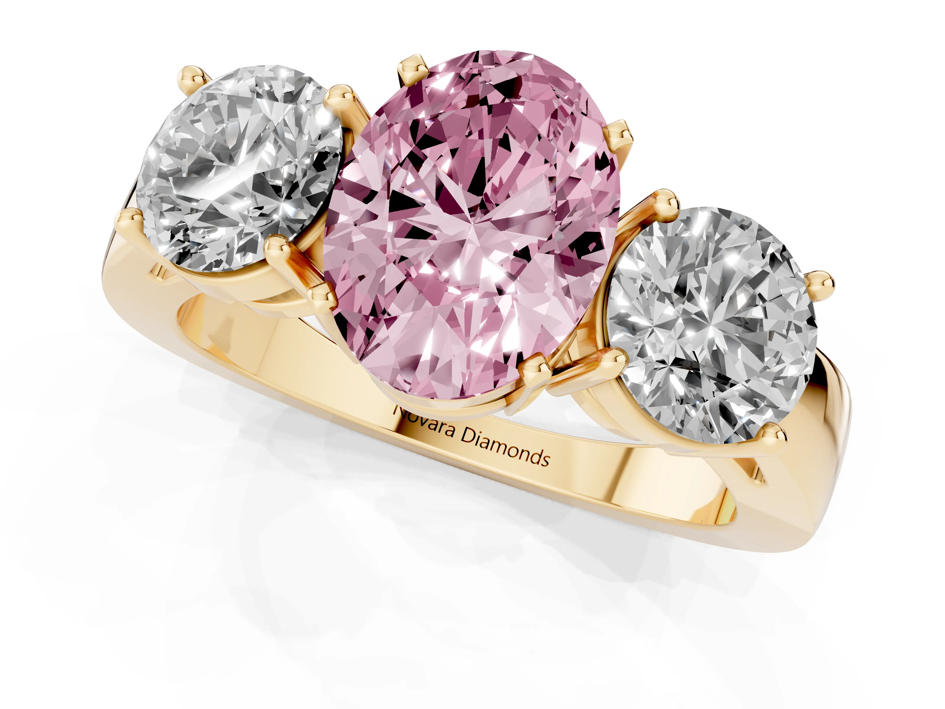 Fancy Pink Oval Cut Diamond Three-Stone Ring Set in Yellow gold with Round Side Stones and Classic Band