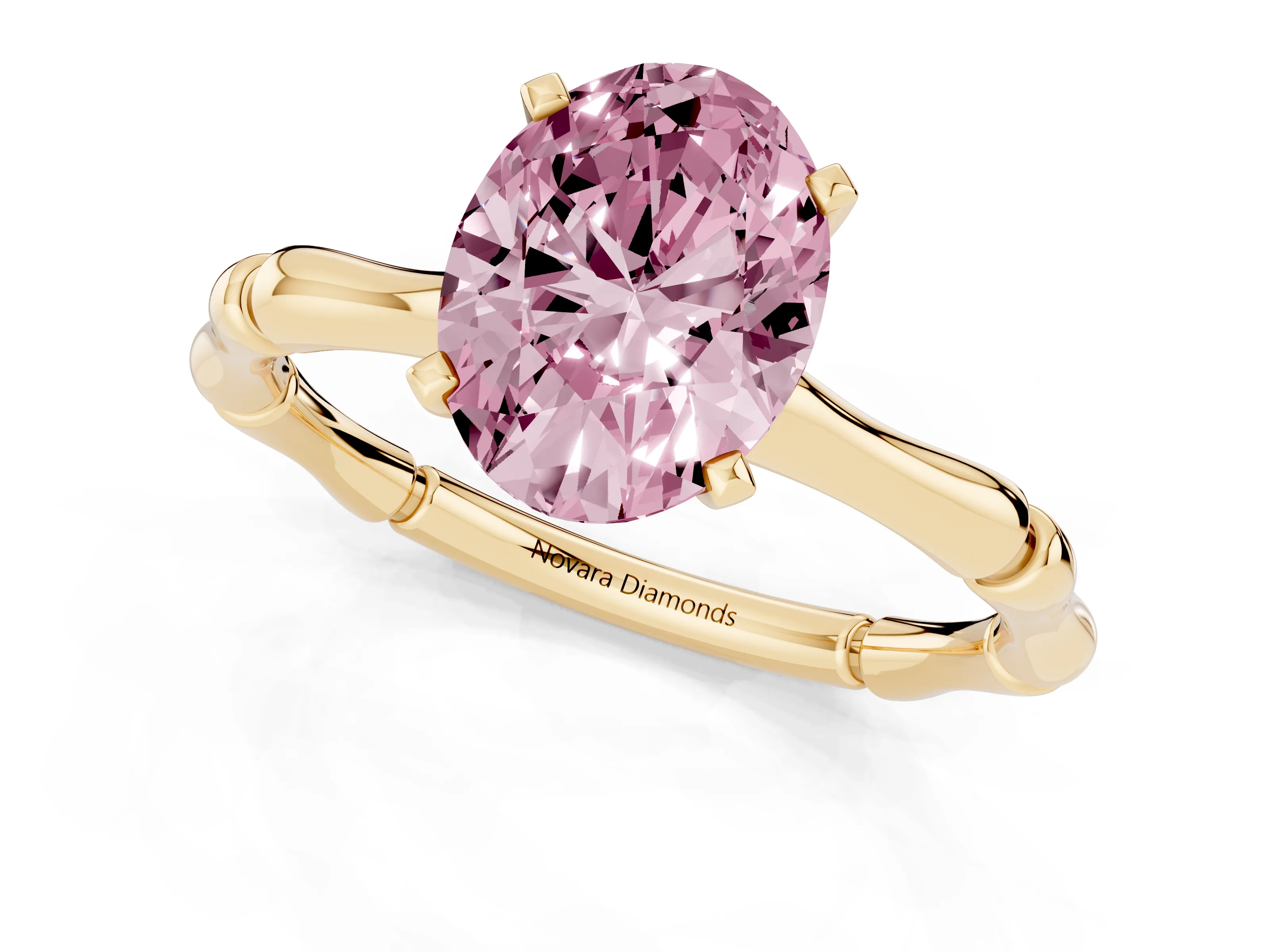 Fancy Pink Oval Cut Diamond Solitaire Ring Set in Yellow gold with Bamboo Band and Prong Setting