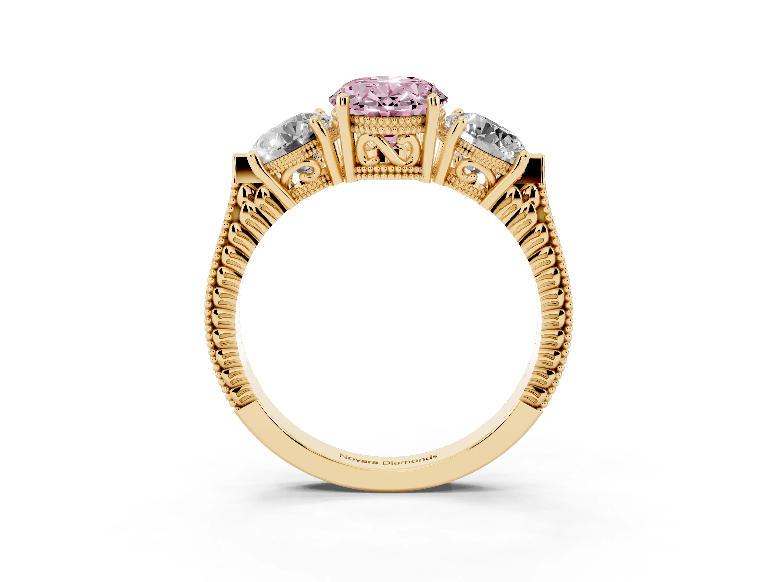 Fancy Pink Oval Cut Diamond Three-Stone Ring Set in Yellow gold with Milgrain Band