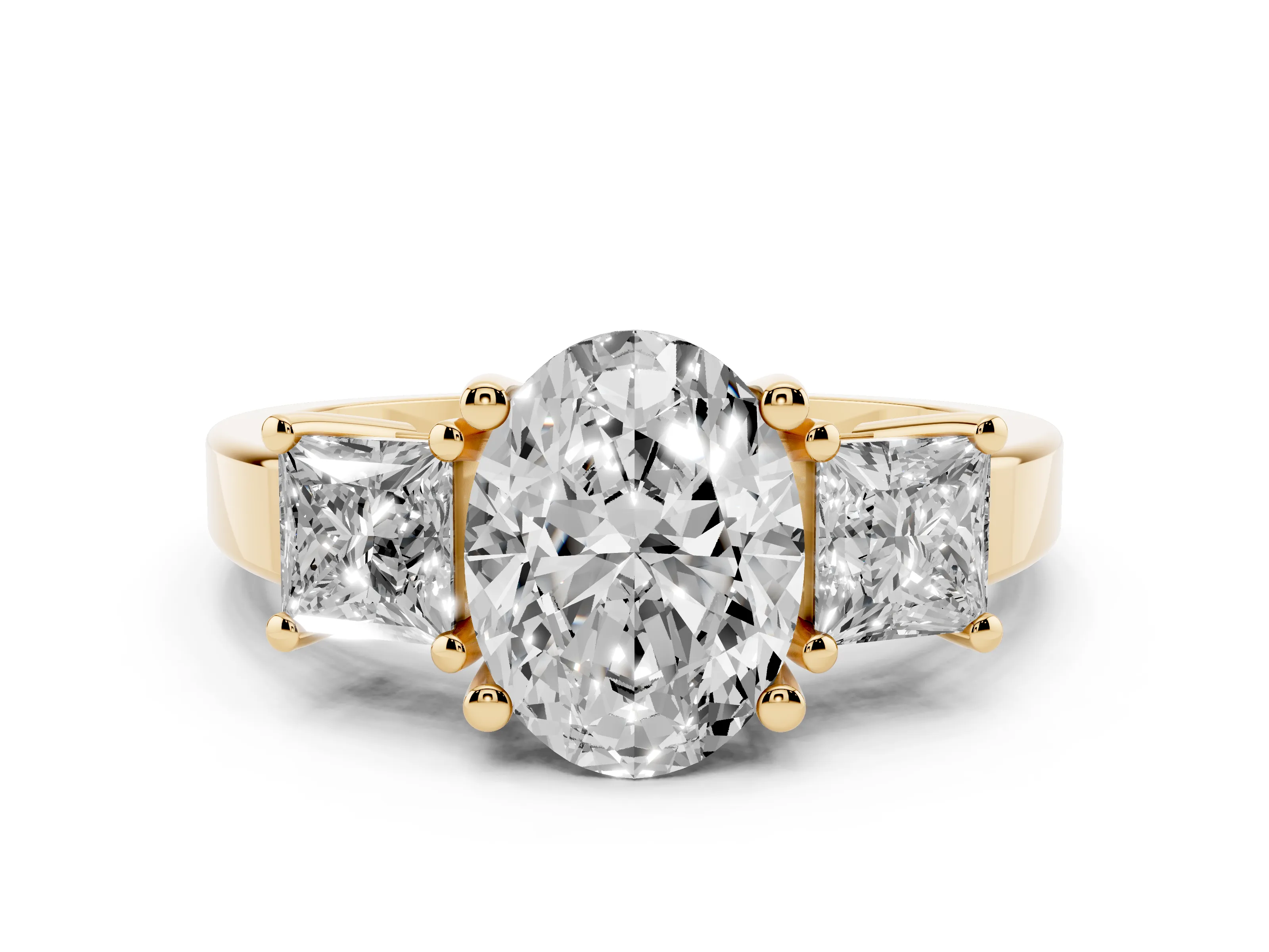 Three-Stone Oval Cut Diamond Solitaire Ring Set in Yellow gold with Prong Setting