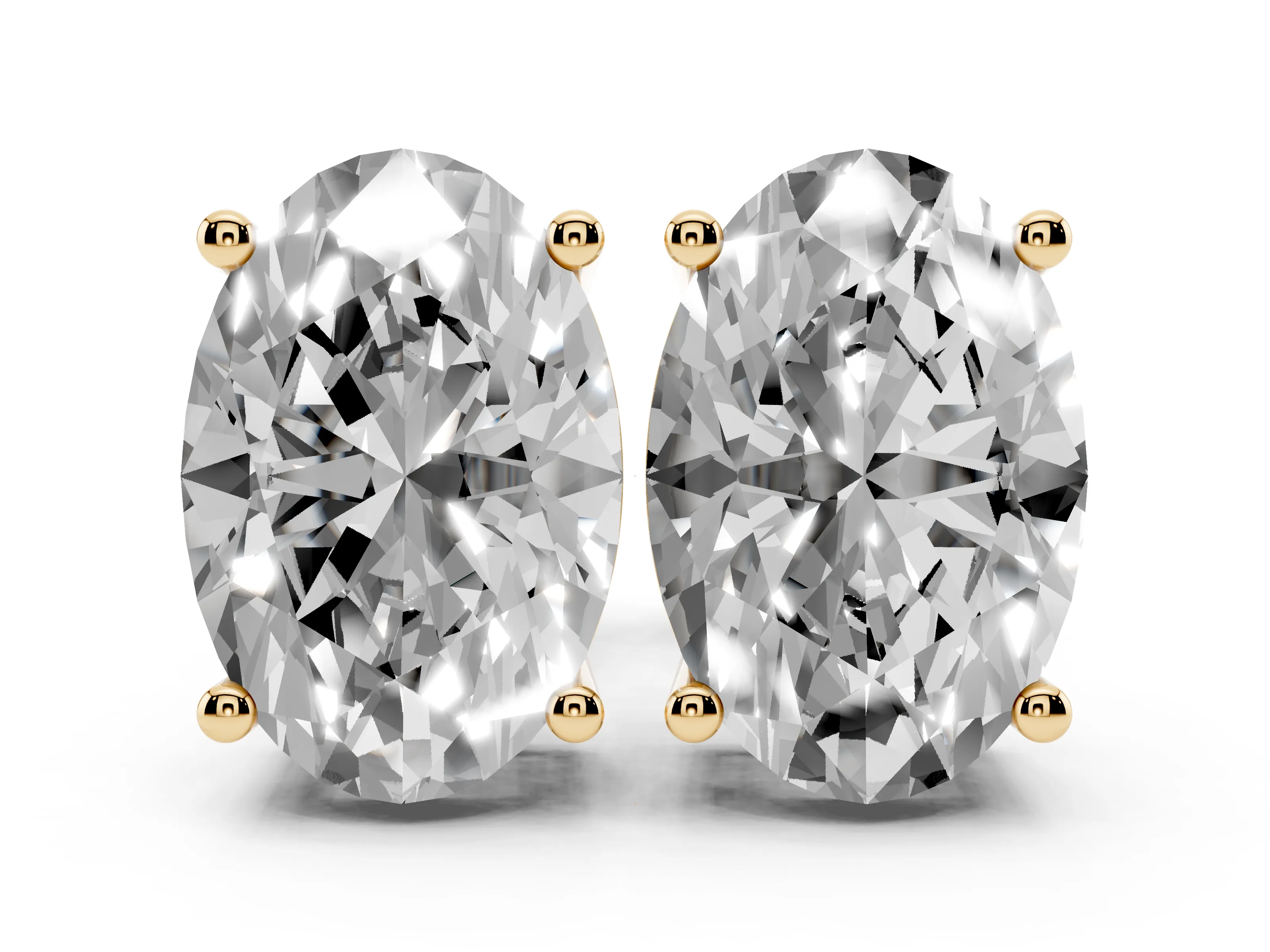Oval Cut Diamond Solitaire Stud Earrings Set in Yellow gold with Basket Setting