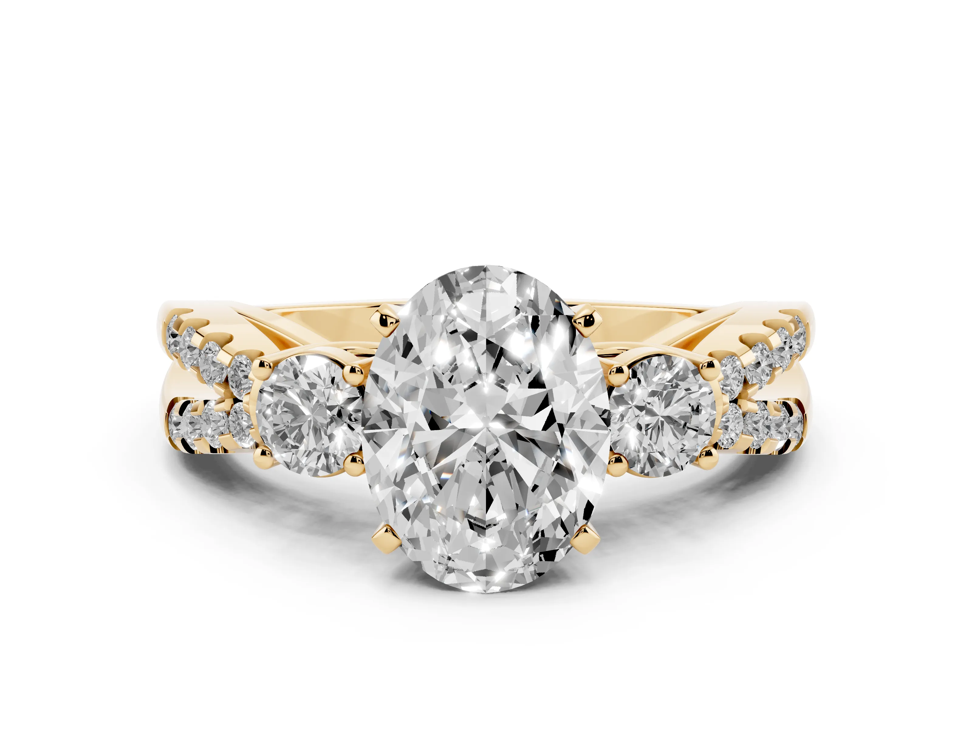 Oval Cut Diamond Three-Stone Ring Set in Yellow gold with Pavé Split Shank and Prong Setting