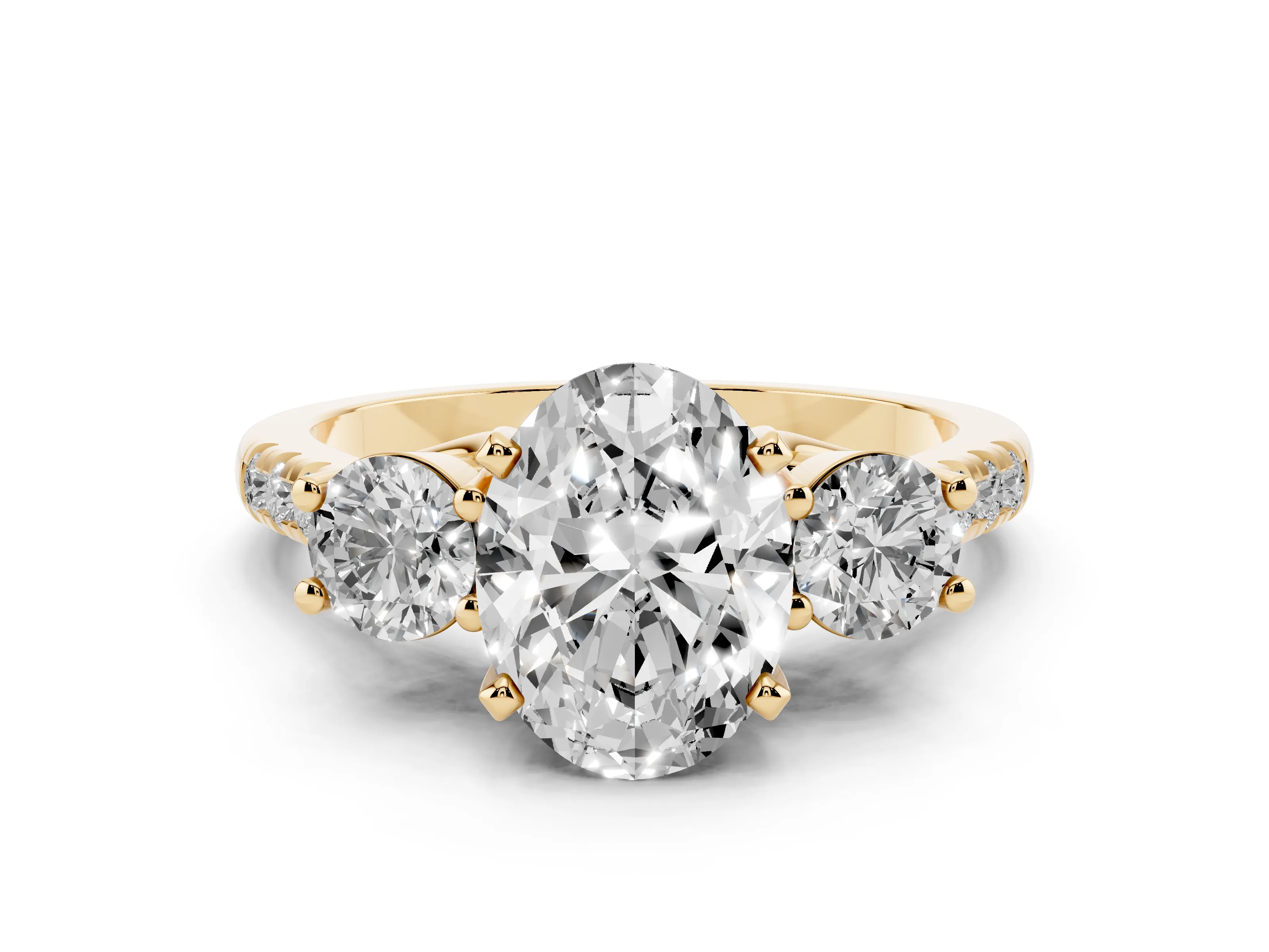 Three-Stone Oval Cut Diamond Pavé Band Ring Set in Yellow gold with Prong-Set Trio