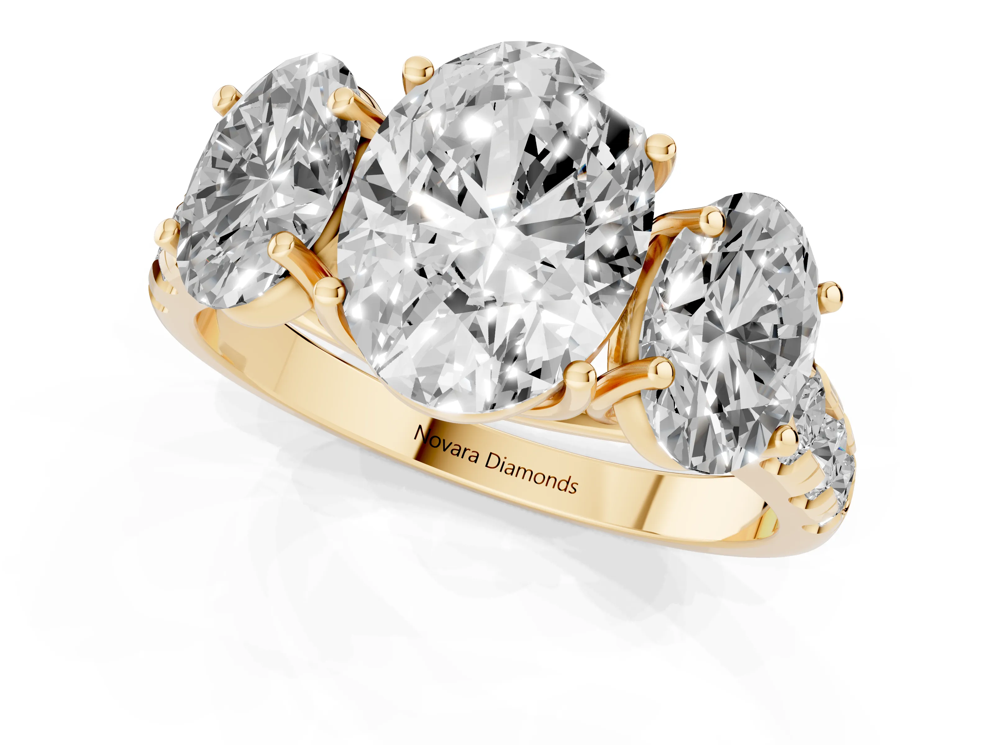 Oval Cut Diamond Three-Stone Ring Set in Yellow gold with Pavé Band