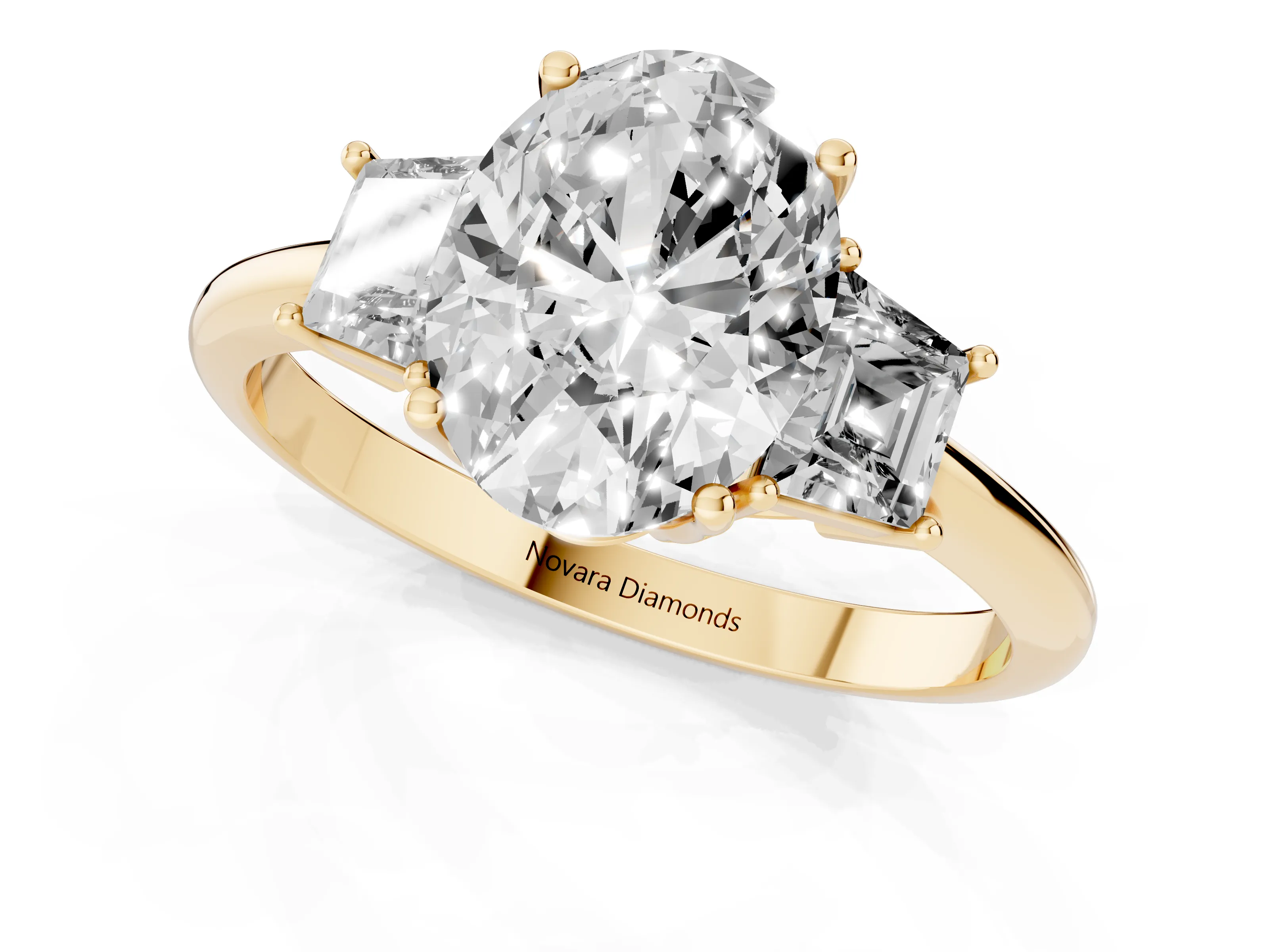 Oval Cut Diamond Three-Stone Ring Set in Yellow gold with Trapezoid Side Stones and Prong Setting
