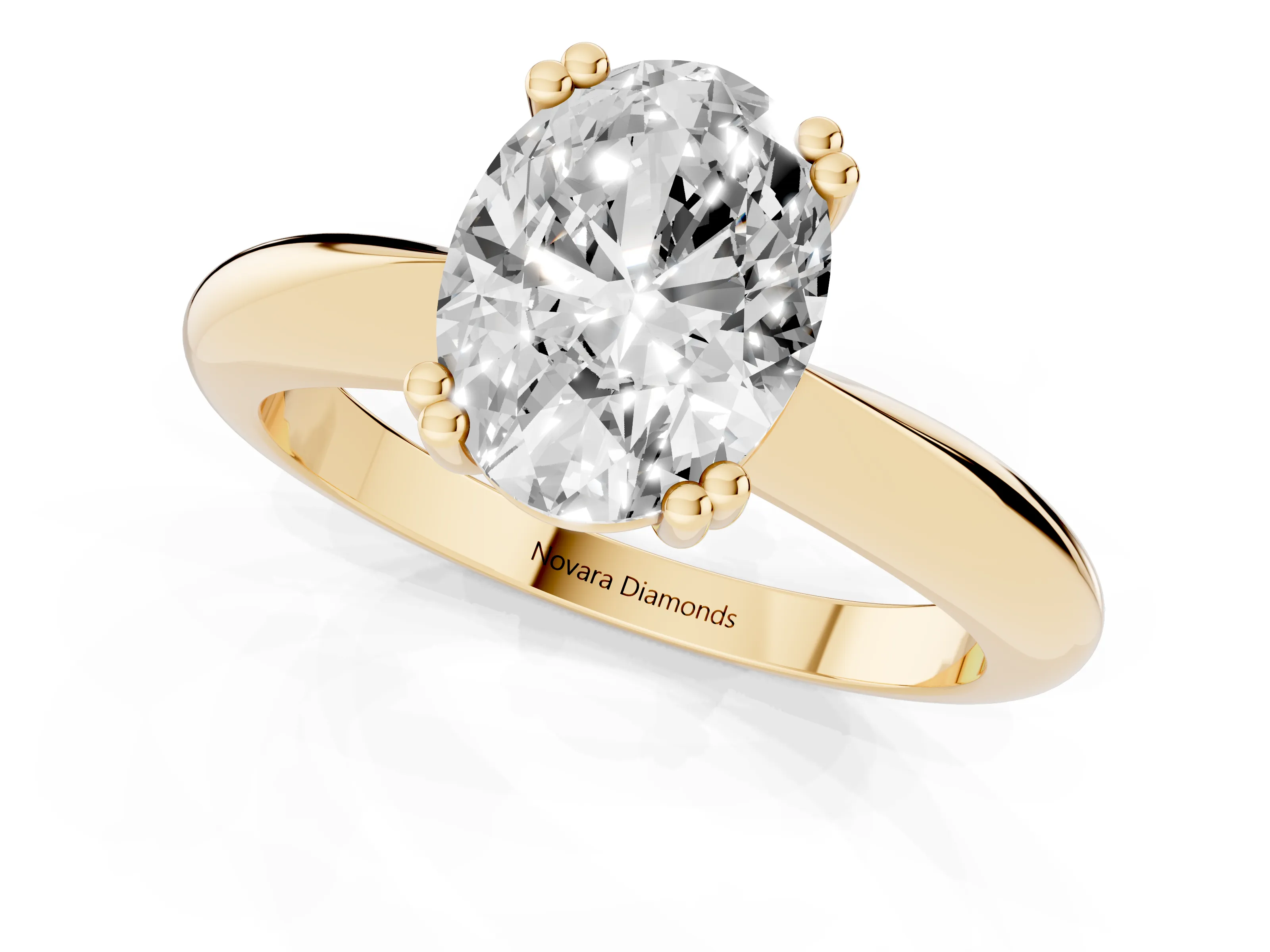 Oval Cut Diamond Solitaire Engagement Ring Set in Yellow gold with Tapered Band and Prong Setting