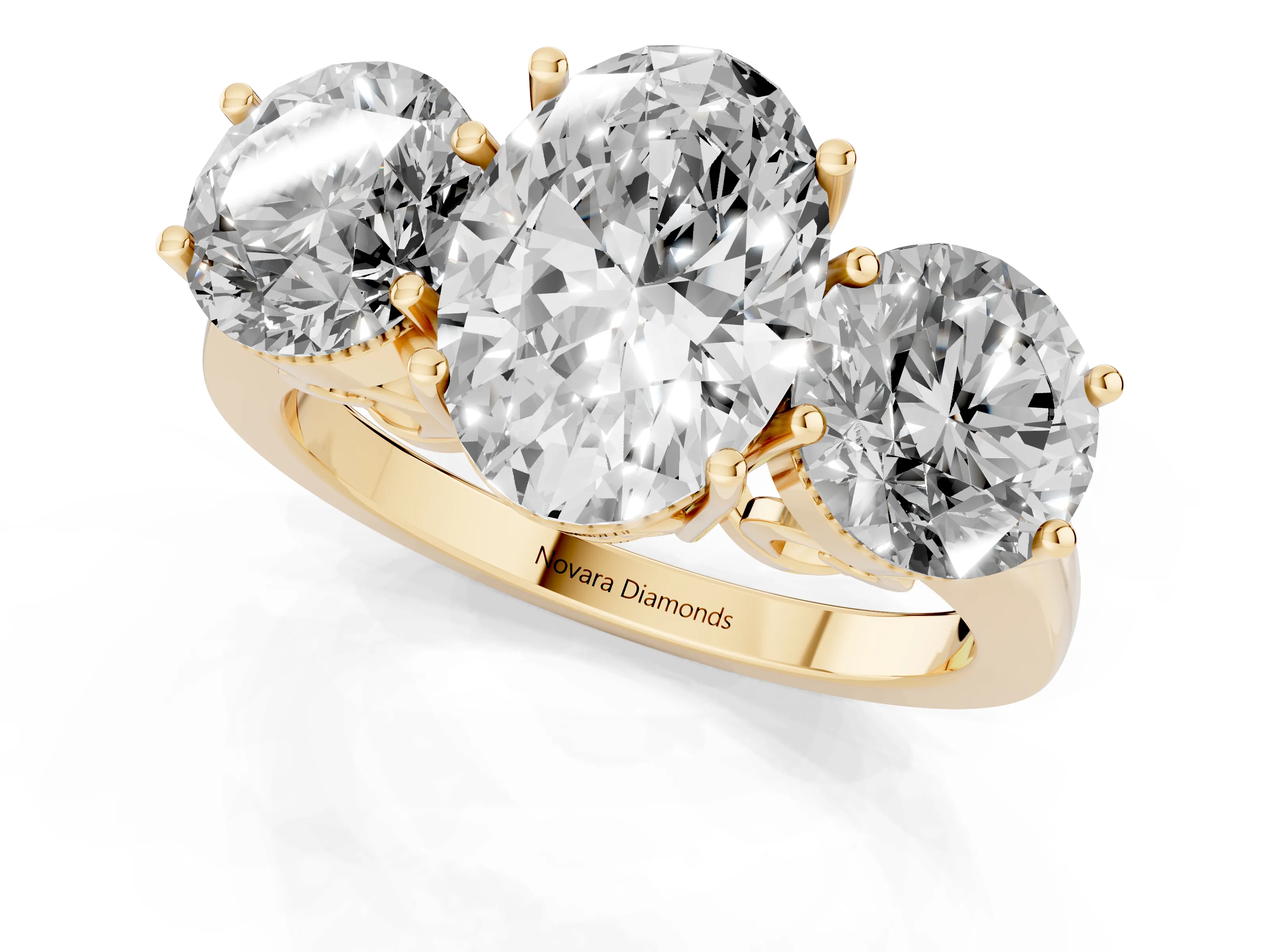 Oval Cut Diamond Three-Stone Engagement Ring Set in Yellow gold with Polished Band