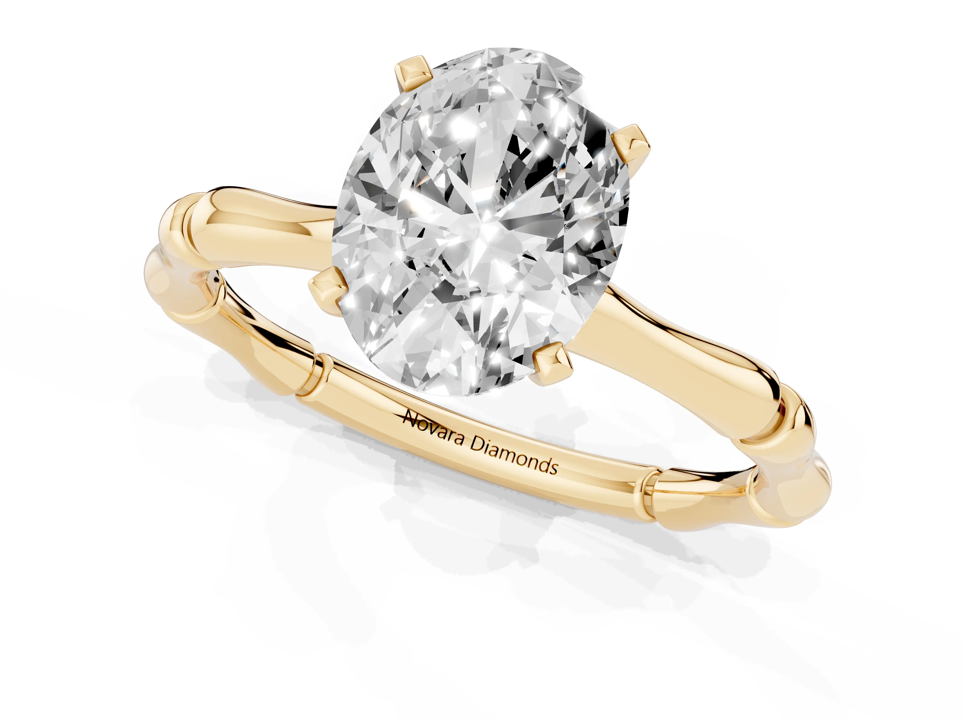 Oval Cut Diamond Solitaire Ring Set in Yellow gold with Bamboo Band and Prong Setting